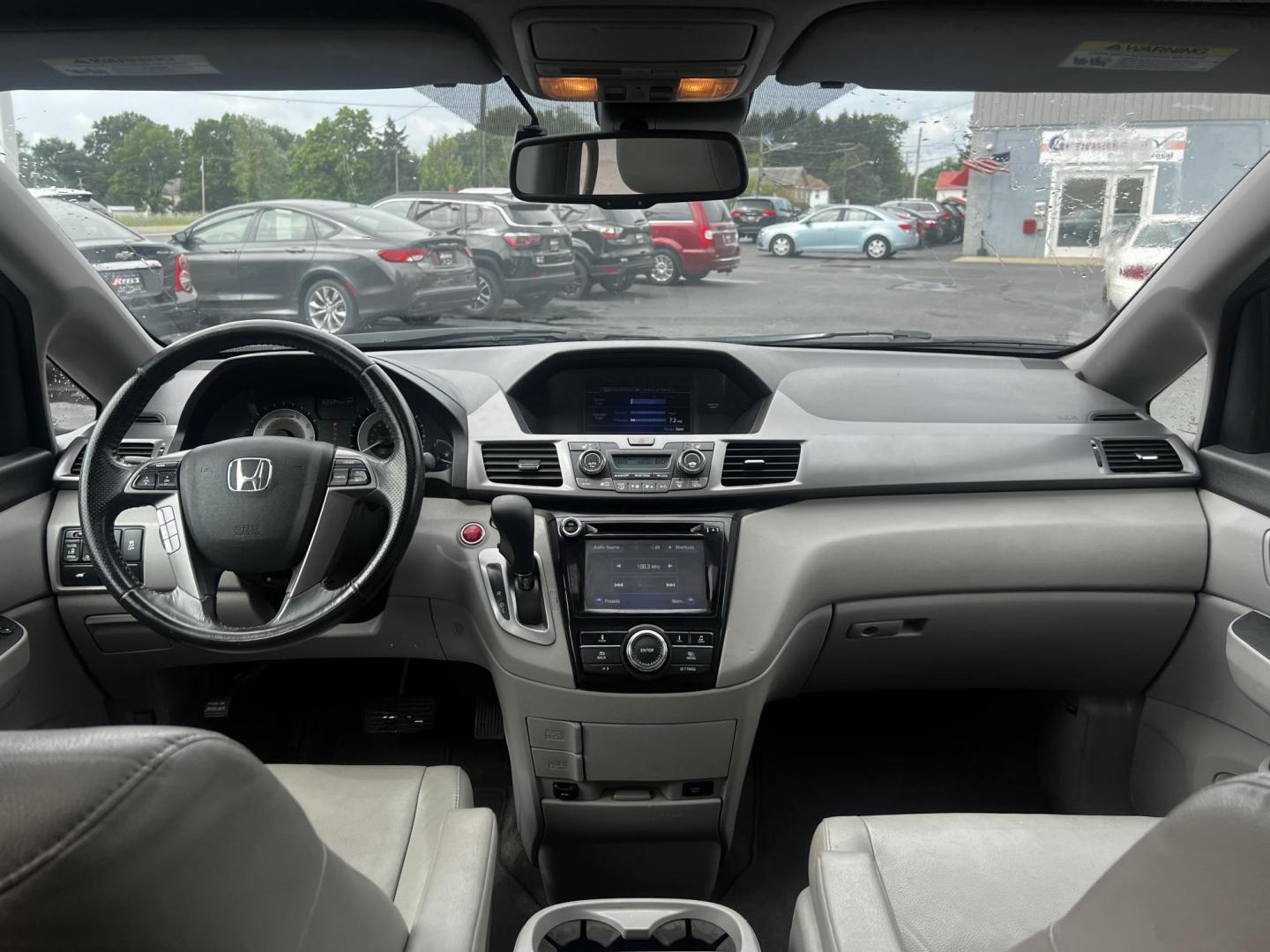 2014 Blue /Tan Honda Odyssey EX-L (5FNRL5H6XEB) with an 3.5L V6 SOHC 24V engine, 6-Speed Automatic transmission, located at 547 E. Main St., Orwell, OH, 44076, (440) 437-5893, 41.535435, -80.847855 - This 2014 Honda Odyssey EX-L is a well-equipped minivan featuring a powerful 3.5-liter SOHC V6 engine with VTEC technology, paired with a 6-speed automatic transmission. It offers a blend of comfort and safety features, including tri-zone automatic climate control, leather interior, heated and power - Photo#38