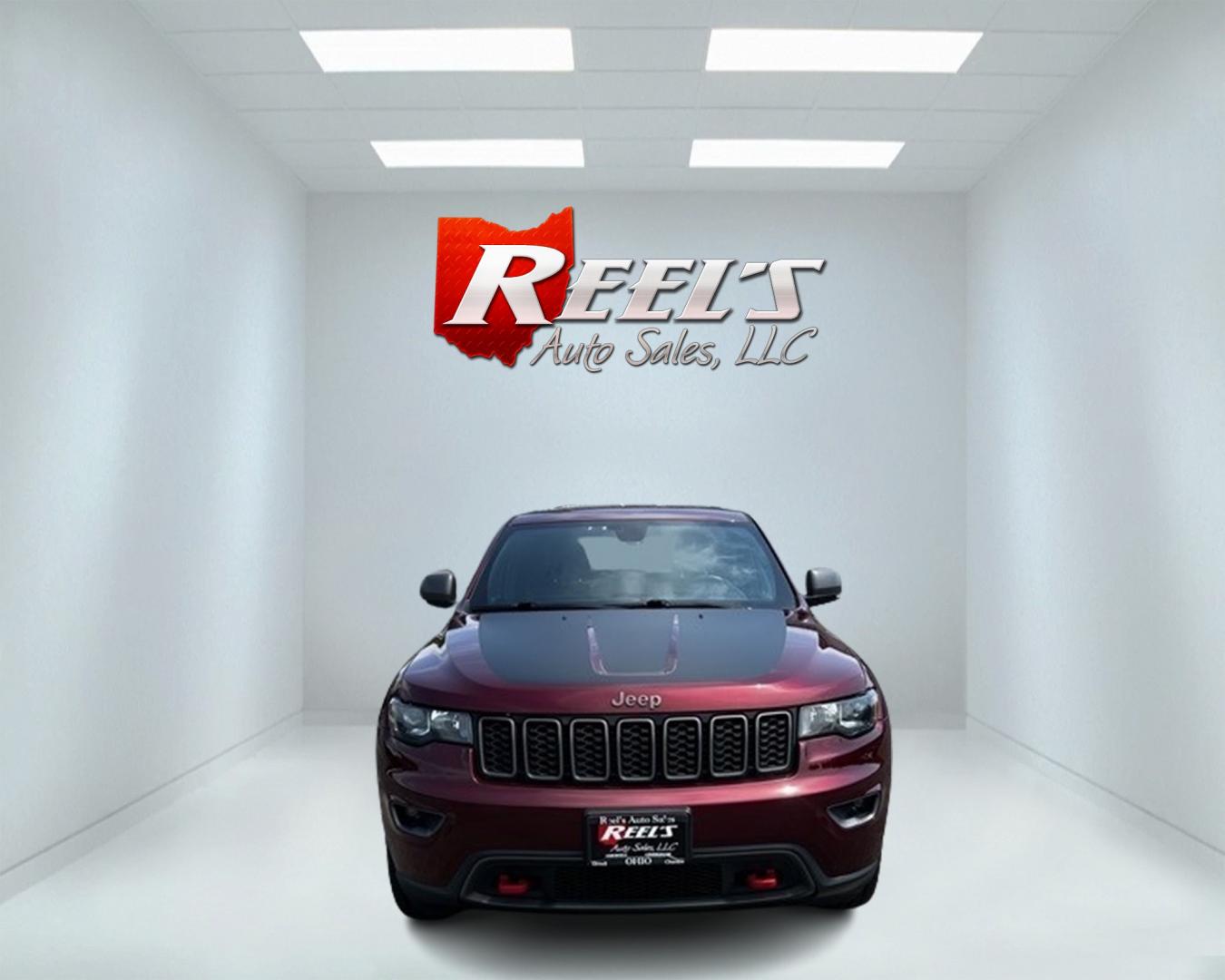 2017 Red /Black Jeep Grand Cherokee Trailhawk 4WD (1C4RJFLG4HC) with an 3.6L V6 DOHC 24V engine, 8A transmission, located at 11115 Chardon Rd. , Chardon, OH, 44024, (440) 214-9705, 41.580246, -81.241943 - This 2017 Jeep Grand Cherokee Trailhawk with a 3.6 Pentastar V6 engine and 8-speed automatic transmission is a well-equipped SUV designed for both rugged off-road performance and everyday comfort. Features like the Quadra Lift Air Suspension, 4WD system, and Electronic Limited Slip Rear Differential - Photo#1