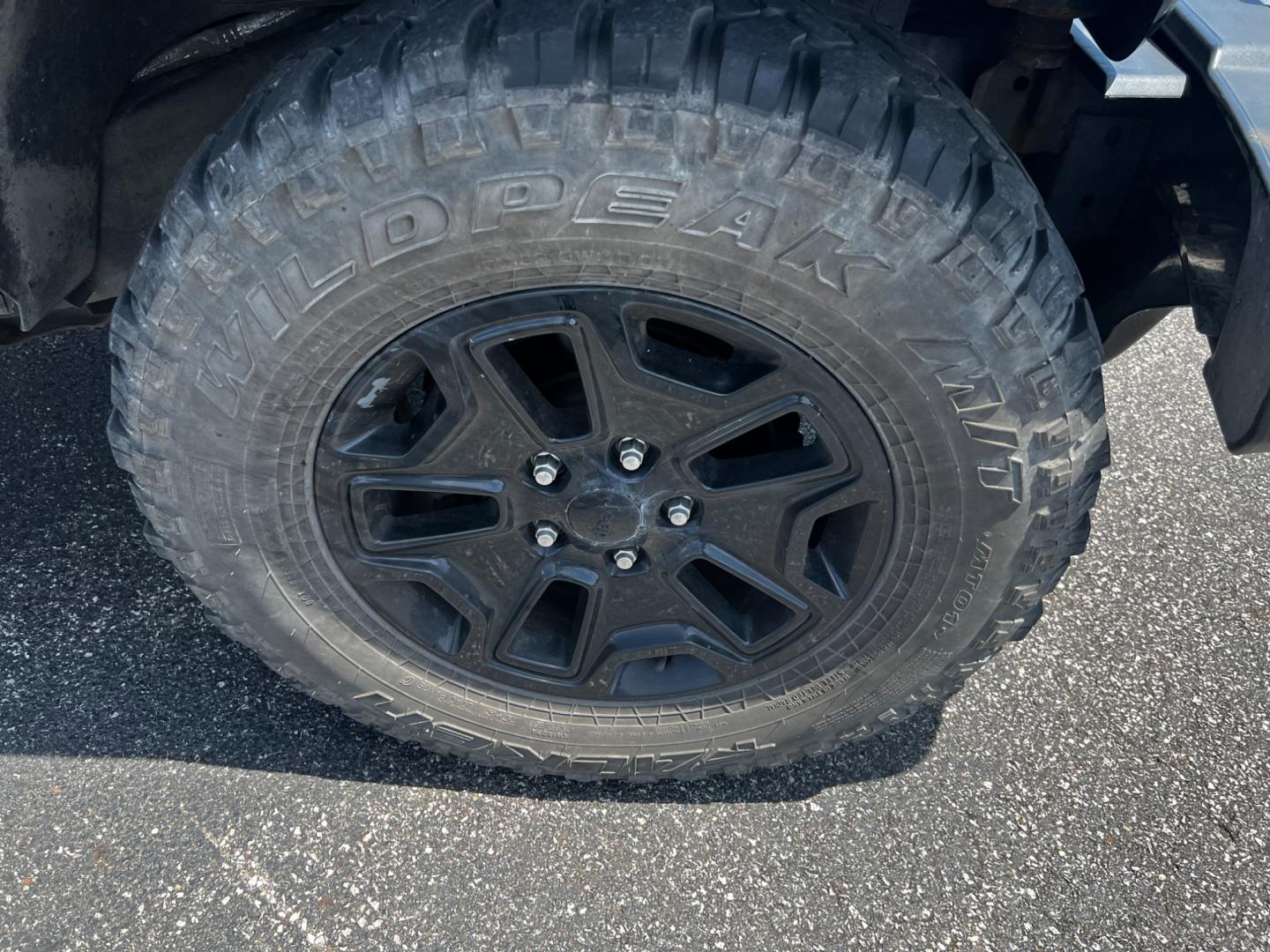 2015 Black /Black Jeep Wrangler Unlimited Willys 4WD (1C4BJWDG9FL) with an 3.6L V6 DOHC 24V engine, 6 Speed Manual transmission, located at 547 E. Main St., Orwell, OH, 44076, (440) 437-5893, 41.535435, -80.847855 - This 2015 Jeep Wrangler Unlimited Willy Wheeler Edition is a capable and well-equipped off-road vehicle. It features a 3.6-liter Pentastar V6 engine paired with a 6-speed manual transmission, offering a traditional driving experience favored by many off-road enthusiasts. The vehicle comes with sever - Photo#10