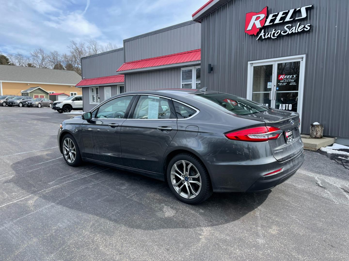 2019 Gray /Black Ford Fusion SEL (3FA6P0CD5KR) with an 1.5L I4 DOHC 16V TURBO engine, 6A transmission, located at 547 E. Main St., Orwell, OH, 44076, (440) 437-5893, 41.535435, -80.847855 - Photo#10