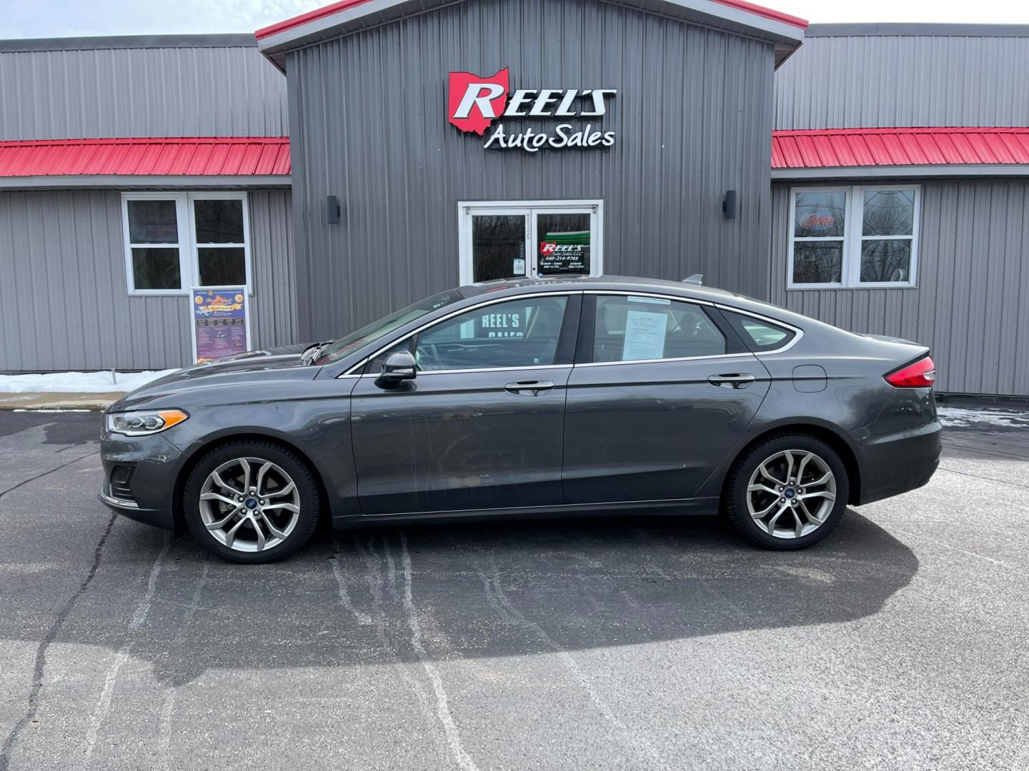 2019 Gray /Black Ford Fusion SEL (3FA6P0CD5KR) with an 1.5L I4 DOHC 16V TURBO engine, 6A transmission, located at 547 E. Main St., Orwell, OH, 44076, (440) 437-5893, 41.535435, -80.847855 - Photo#13