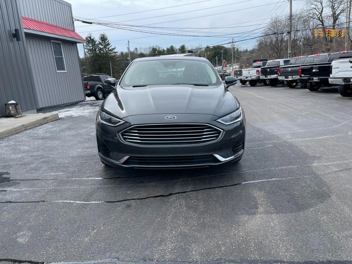 2019 Gray /Black Ford Fusion SEL (3FA6P0CD5KR) with an 1.5L I4 DOHC 16V TURBO engine, 6A transmission, located at 547 E. Main St., Orwell, OH, 44076, (440) 437-5893, 41.535435, -80.847855 - Photo#1