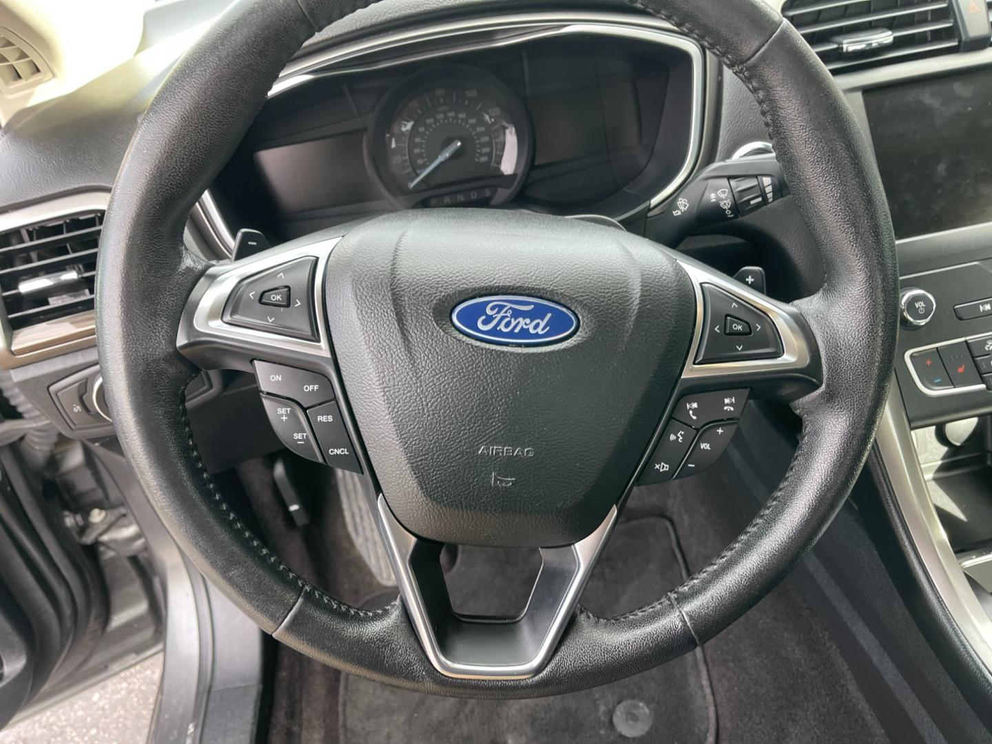 2019 Gray /Black Ford Fusion SEL (3FA6P0CD5KR) with an 1.5L I4 DOHC 16V TURBO engine, 6A transmission, located at 547 E. Main St., Orwell, OH, 44076, (440) 437-5893, 41.535435, -80.847855 - Photo#26