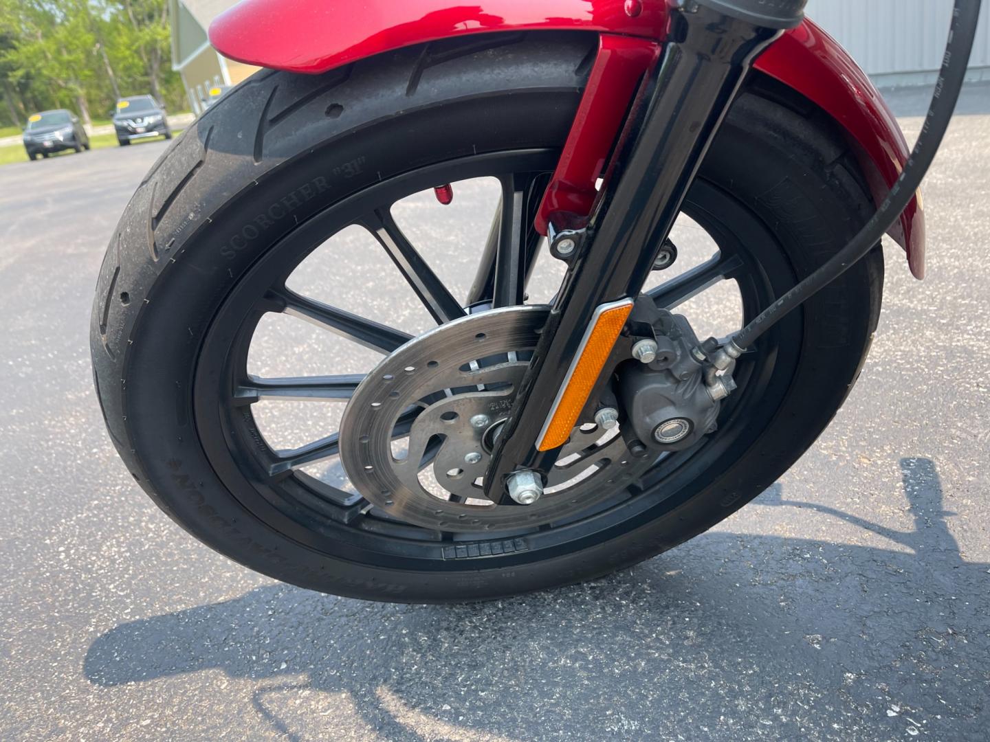 2012 Red /Black Harley-Davidson XL883N XL 883 (1HD4LE214CC) with an 883 CC Twin V engine, 5 Speed Manual transmission, located at 11115 Chardon Rd. , Chardon, OH, 44024, (440) 214-9705, 41.580246, -81.241943 - Photo#10