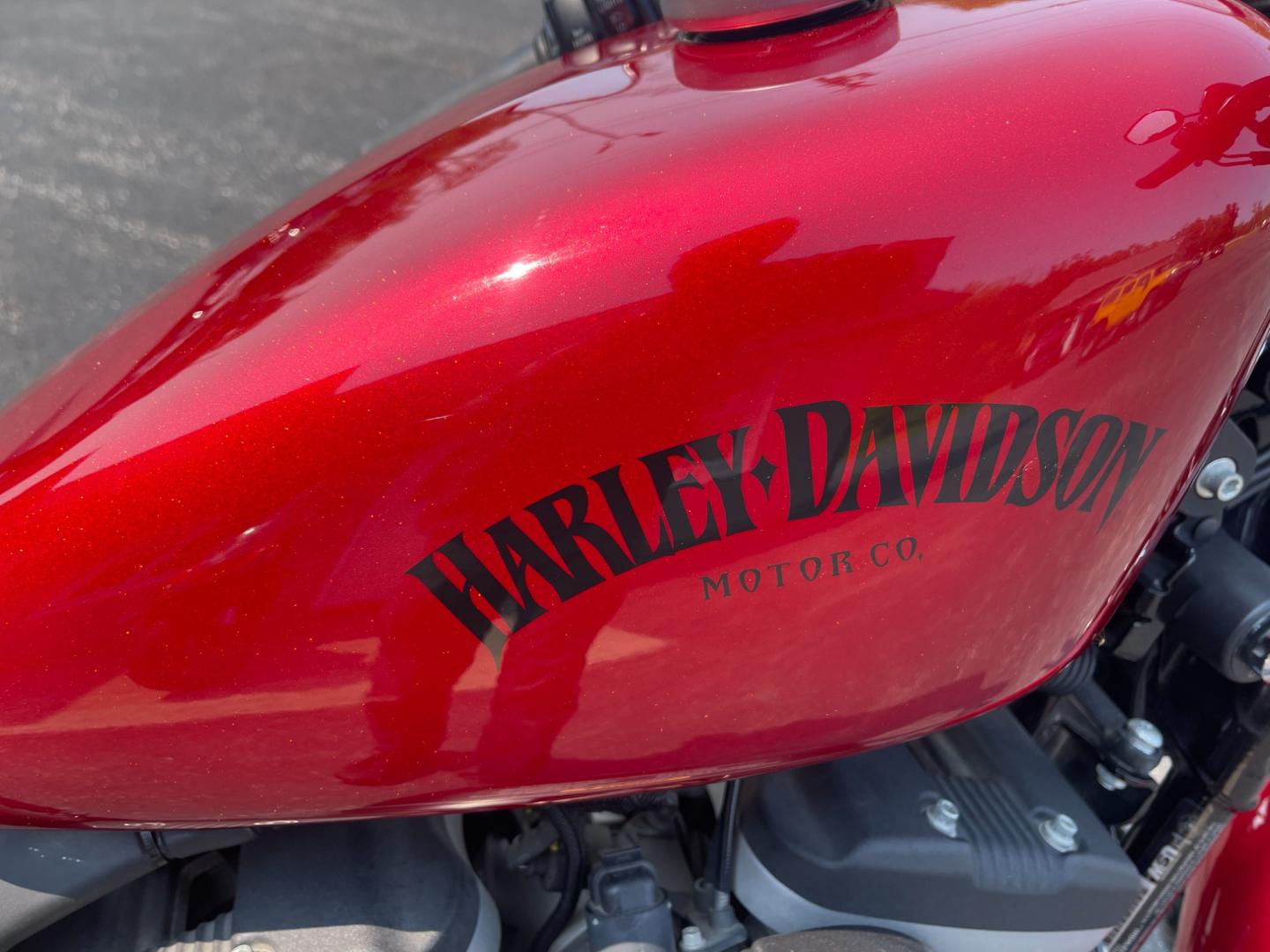 2012 Red /Black Harley-Davidson XL883N XL 883 (1HD4LE214CC) with an 883 CC Twin V engine, 5 Speed Manual transmission, located at 11115 Chardon Rd. , Chardon, OH, 44024, (440) 214-9705, 41.580246, -81.241943 - Photo#4