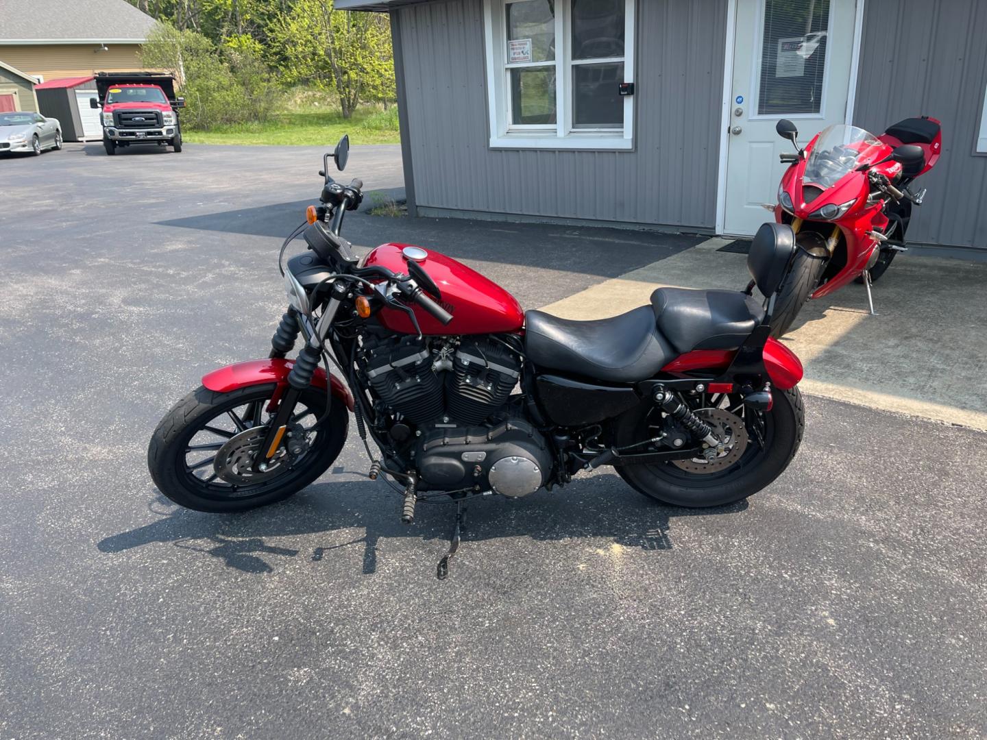 2012 Red /Black Harley-Davidson XL883N XL 883 (1HD4LE214CC) with an 883 CC Twin V engine, 5 Speed Manual transmission, located at 11115 Chardon Rd. , Chardon, OH, 44024, (440) 214-9705, 41.580246, -81.241943 - Photo#8