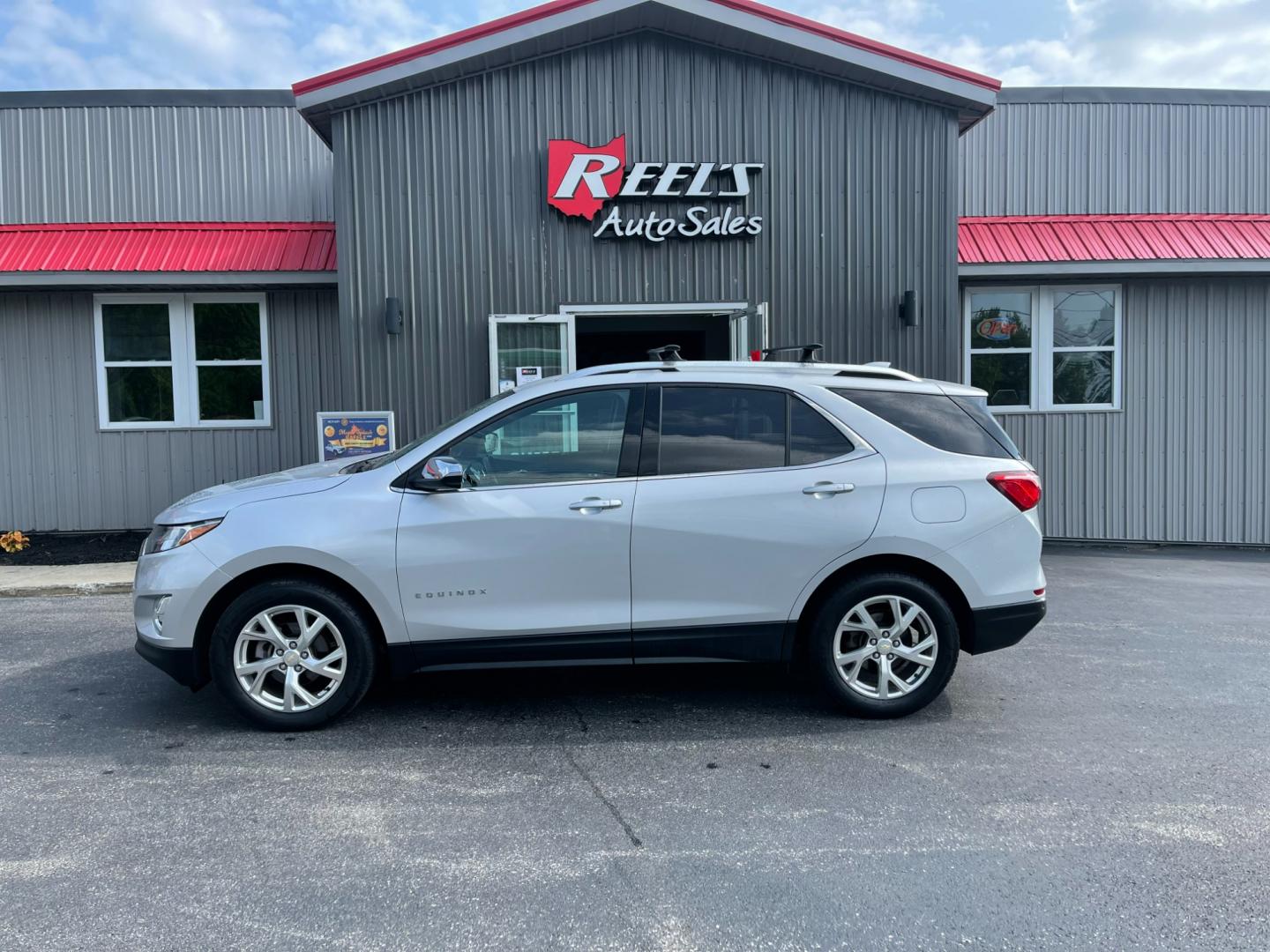 2018 Silver /Black Chevrolet Equinox Premier AWD (2GNAXVEV1J6) with an 1.5L I4 DIR DOHC 16V TURBO engine, 6A transmission, located at 11115 Chardon Rd. , Chardon, OH, 44024, (440) 214-9705, 41.580246, -81.241943 - Photo#13