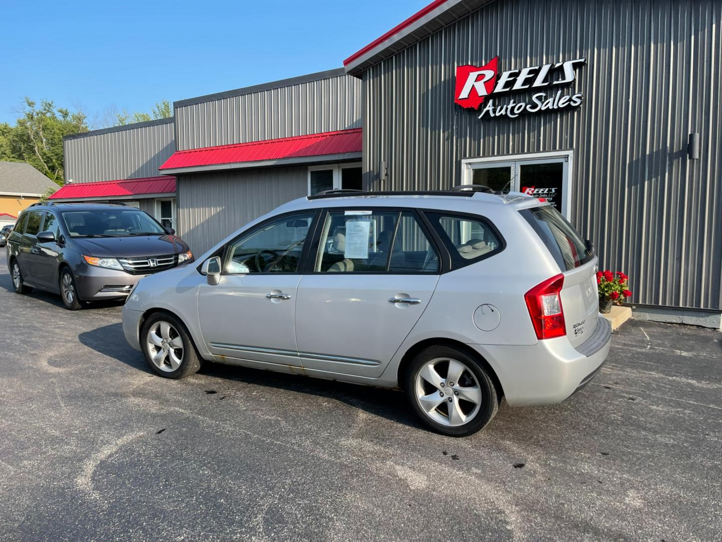 2007 Silver /Black Kia Rondo EX V6 (KNAFG526277) with an 2.7L V6 DOHC 24V engine, 5-Speed Automatic Overdrive transmission, located at 11115 Chardon Rd. , Chardon, OH, 44024, (440) 214-9705, 41.580246, -81.241943 - Photo#11