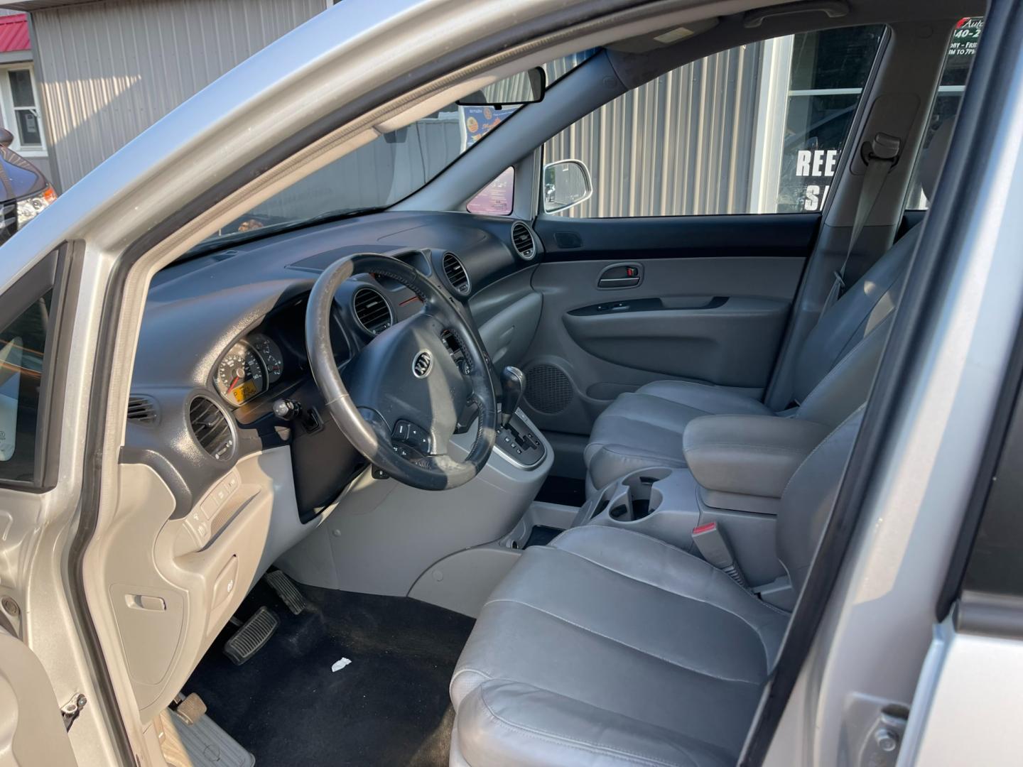 2007 Silver /Black Kia Rondo EX V6 (KNAFG526277) with an 2.7L V6 DOHC 24V engine, 5-Speed Automatic Overdrive transmission, located at 11115 Chardon Rd. , Chardon, OH, 44024, (440) 214-9705, 41.580246, -81.241943 - Photo#16