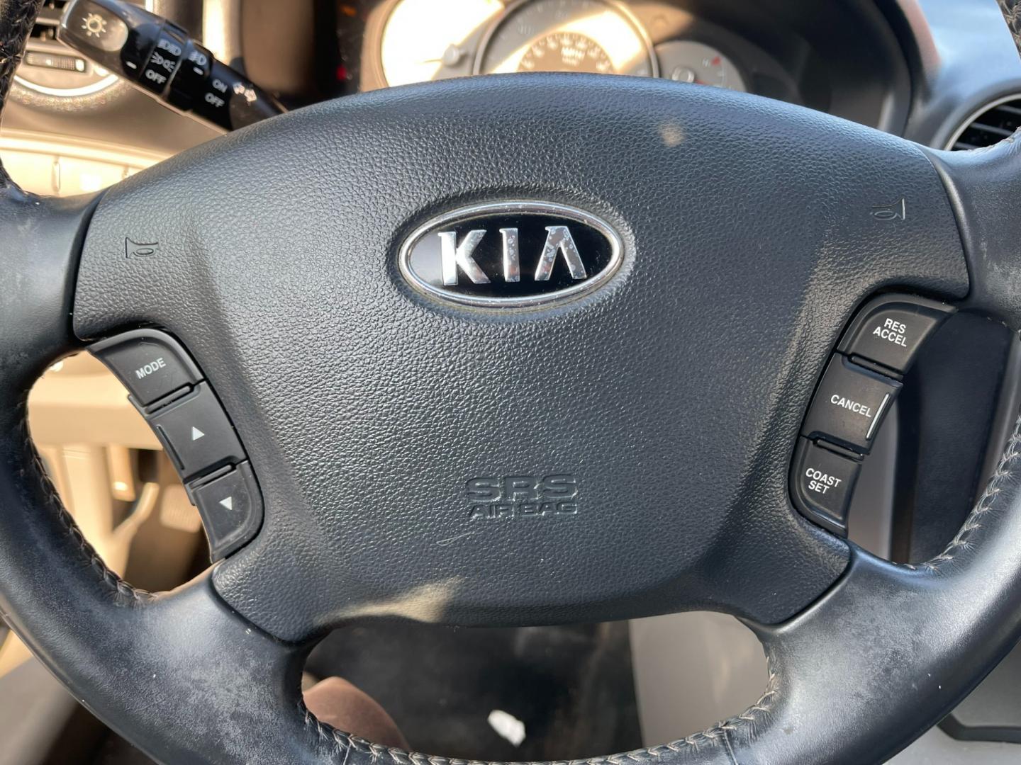 2007 Silver /Black Kia Rondo EX V6 (KNAFG526277) with an 2.7L V6 DOHC 24V engine, 5-Speed Automatic Overdrive transmission, located at 11115 Chardon Rd. , Chardon, OH, 44024, (440) 214-9705, 41.580246, -81.241943 - Photo#23