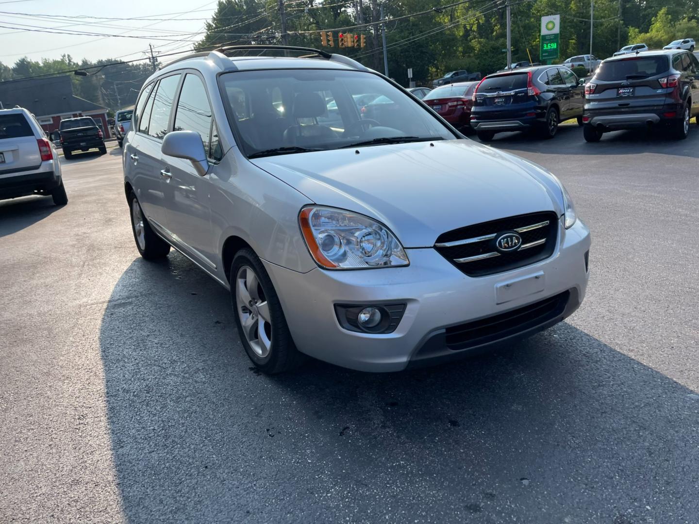 2007 Silver /Black Kia Rondo EX V6 (KNAFG526277) with an 2.7L V6 DOHC 24V engine, 5-Speed Automatic Overdrive transmission, located at 11115 Chardon Rd. , Chardon, OH, 44024, (440) 214-9705, 41.580246, -81.241943 - Photo#2