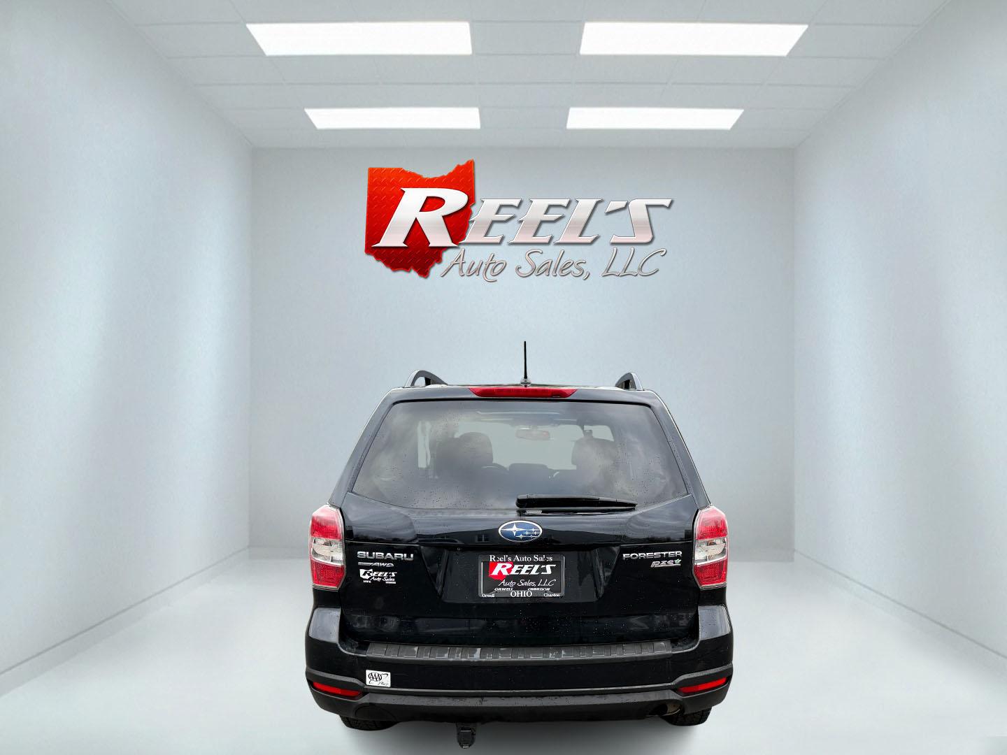 2015 Black /Black Subaru Forester 2.5i Premium (JF2SJADC9FH) with an 2.5L H4 DOHC 16V engine, Automatic transmission, located at 11115 Chardon Rd. , Chardon, OH, 44024, (440) 214-9705, 41.580246, -81.241943 - This 2015 Subaru Forester 2.5i Premium is a versatile SUV, equipped with a 2.5-liter H4 engine and Subaru's Symmetrical All-Wheel Drive system, providing both confident handling and capability across diverse terrains. With a highway fuel efficiency of 31 MPG, it balances performance with cost-effect - Photo#40