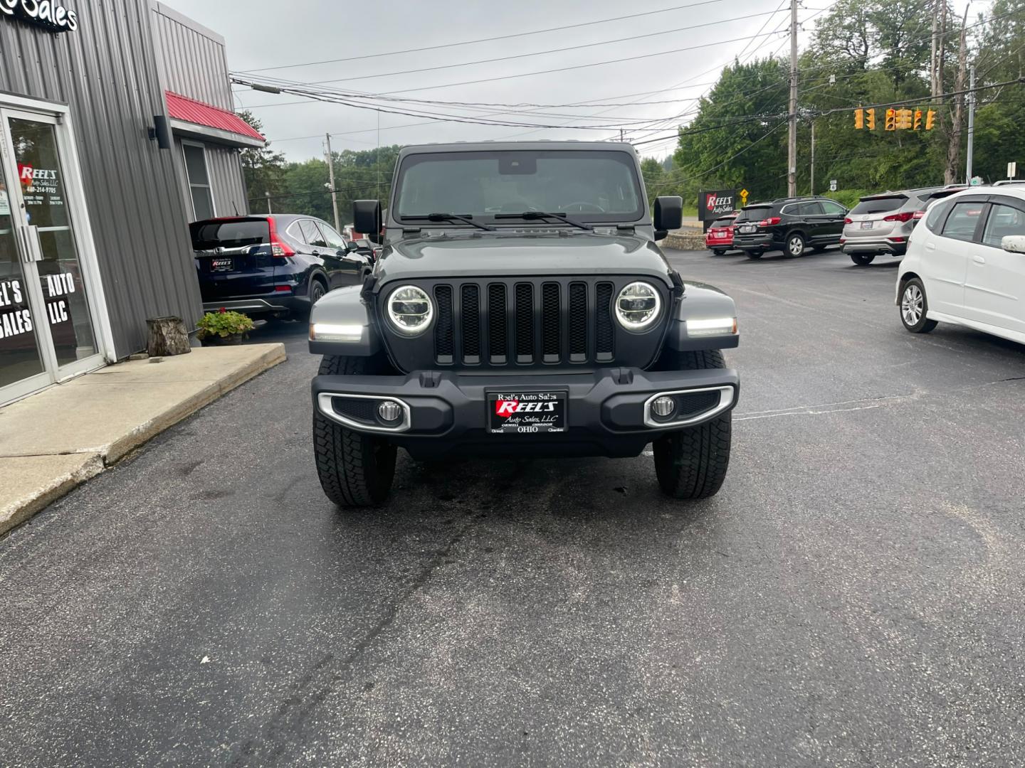 2019 Gray /Black Jeep Wrangler Unlimited Sahara (1C4HJXEG1KW) with an 3.6L V6 DOHC 24V engine, 8A transmission, located at 11115 Chardon Rd. , Chardon, OH, 44024, (440) 214-9705, 41.580246, -81.241943 - Photo#1