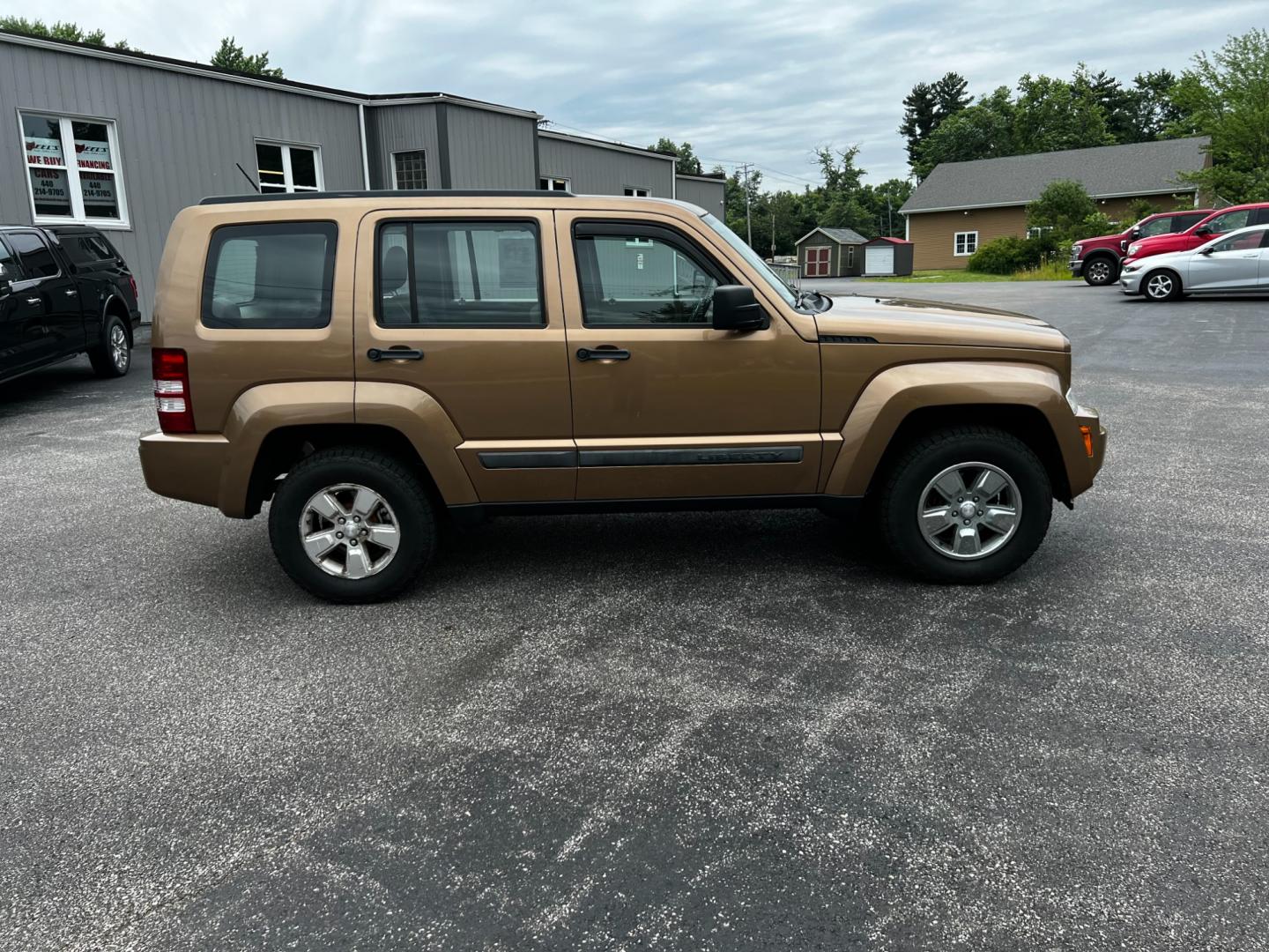 2012 Brown /Gray Jeep Liberty Sport 4WD (1C4PJMAK4CW) with an 3.7L V6 SOHC 12V engine, 4-Speed Automatic transmission, located at 547 E. Main St., Orwell, OH, 44076, (440) 437-5893, 41.535435, -80.847855 - This 2012 Jeep Liberty Sport is a reliable and capable off-road vehicle, featuring a 3.7-liter SOHC V6 engine and a 4-speed automatic transmission. With Trail Rated capability, it can handle tough terrain and inclement weather conditions. The dusk-sensing headlights adjust to changing light conditio - Photo#14