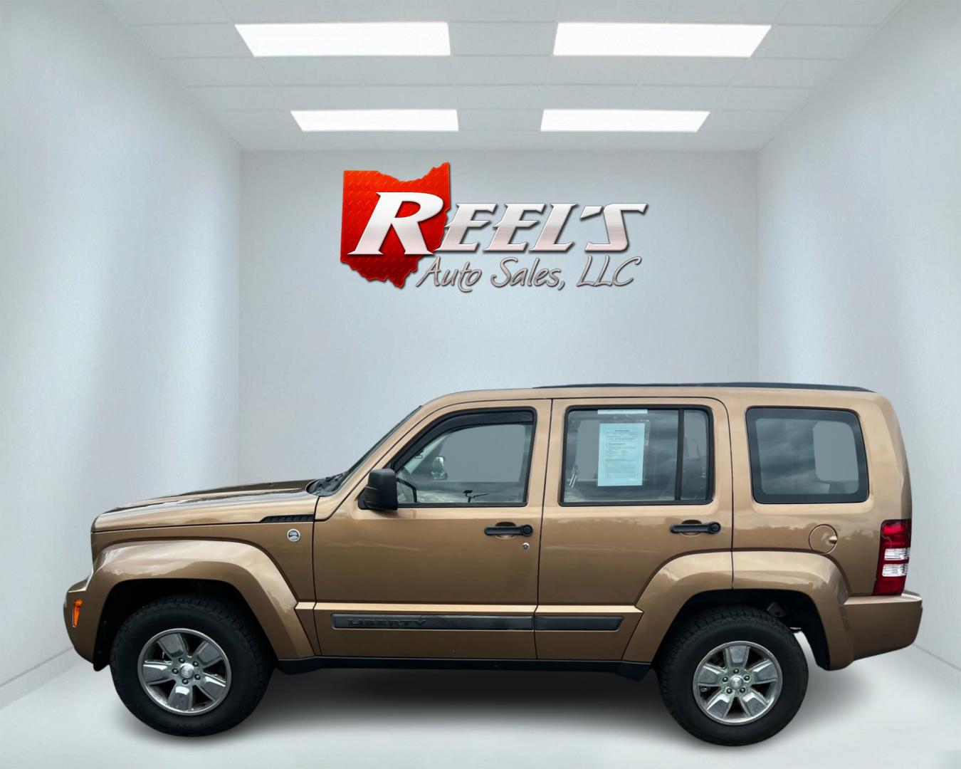 2012 Brown /Gray Jeep Liberty Sport 4WD (1C4PJMAK4CW) with an 3.7L V6 SOHC 12V engine, 4-Speed Automatic transmission, located at 547 E. Main St., Orwell, OH, 44076, (440) 437-5893, 41.535435, -80.847855 - This 2012 Jeep Liberty Sport is a reliable and capable off-road vehicle, featuring a 3.7-liter SOHC V6 engine and a 4-speed automatic transmission. With Trail Rated capability, it can handle tough terrain and inclement weather conditions. The dusk-sensing headlights adjust to changing light conditio - Photo#8