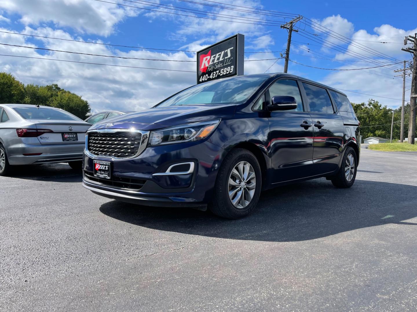 2020 Blue /Tan Kia Sedona LX (KNDMB5C12L6) with an 3.3L V6 DOHC 24V engine, 8-Speed Automatic transmission, located at 547 E. Main St., Orwell, OH, 44076, (440) 437-5893, 41.535435, -80.847855 - Photo#0