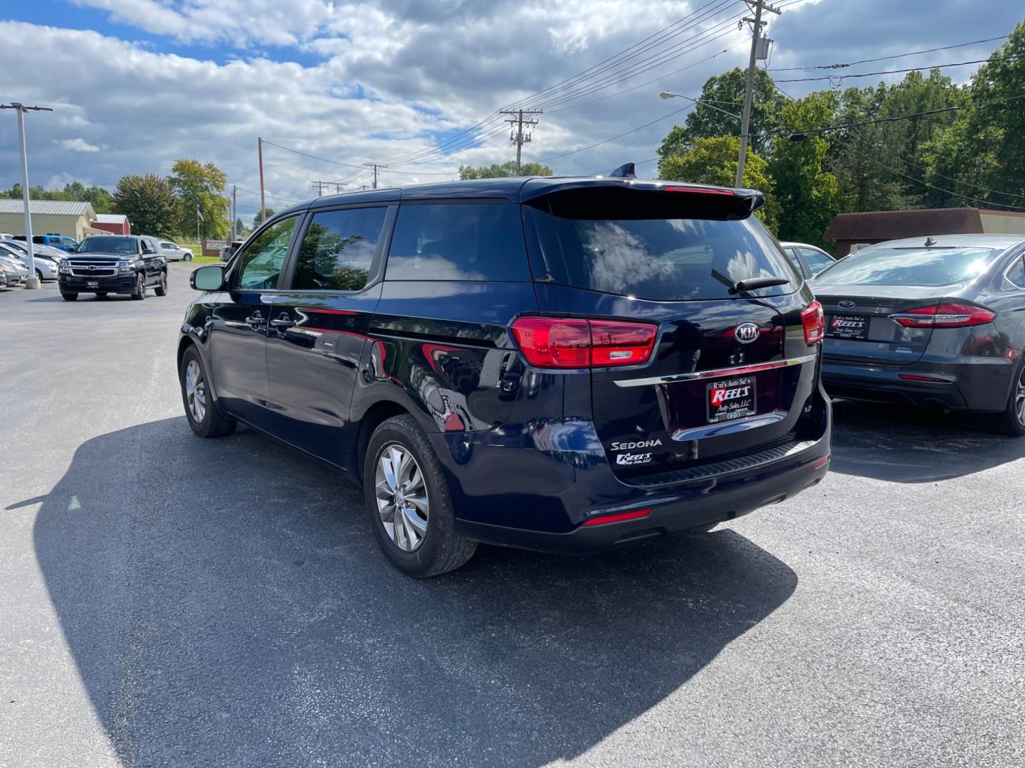 2020 Blue /Tan Kia Sedona LX (KNDMB5C12L6) with an 3.3L V6 DOHC 24V engine, 8-Speed Automatic transmission, located at 547 E. Main St., Orwell, OH, 44076, (440) 437-5893, 41.535435, -80.847855 - Photo#11