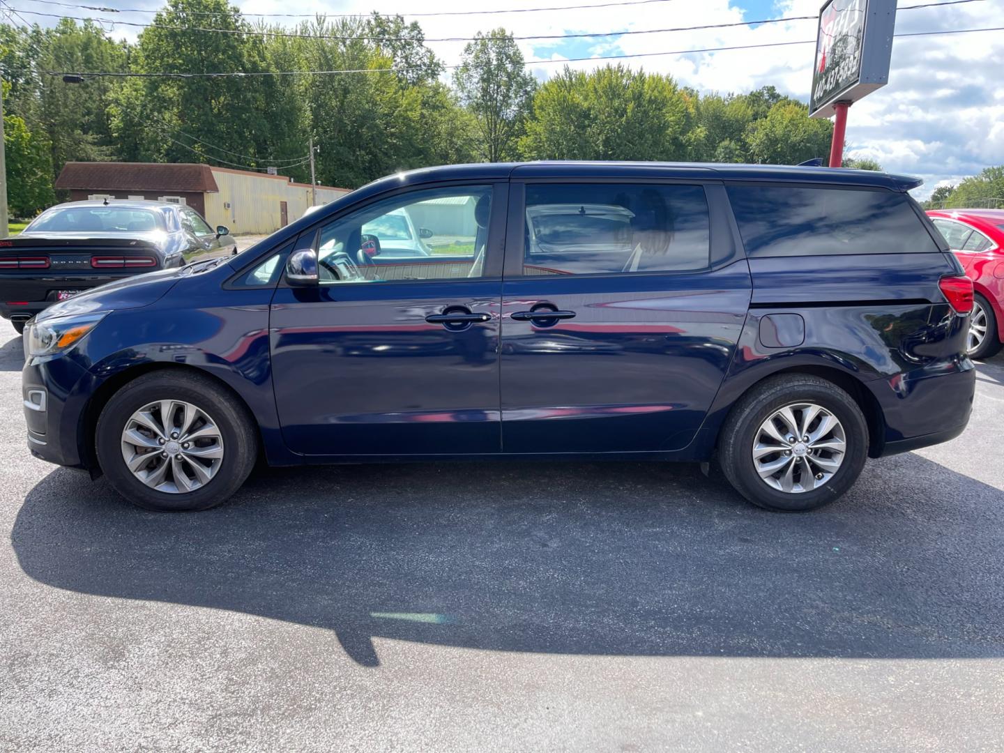 2020 Blue /Tan Kia Sedona LX (KNDMB5C12L6) with an 3.3L V6 DOHC 24V engine, 8-Speed Automatic transmission, located at 547 E. Main St., Orwell, OH, 44076, (440) 437-5893, 41.535435, -80.847855 - Photo#14