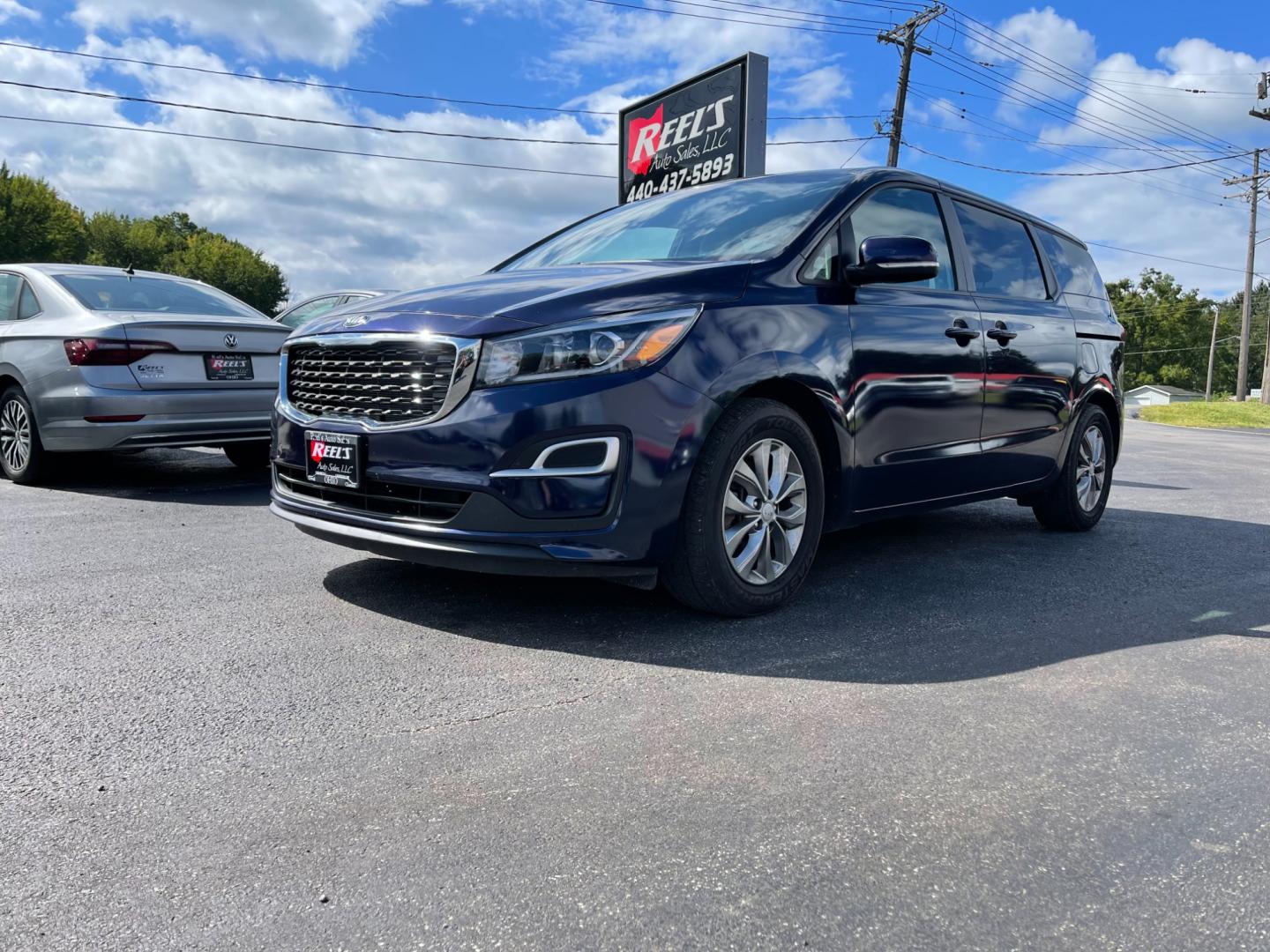 2020 Blue /Tan Kia Sedona LX (KNDMB5C12L6) with an 3.3L V6 DOHC 24V engine, 8-Speed Automatic transmission, located at 547 E. Main St., Orwell, OH, 44076, (440) 437-5893, 41.535435, -80.847855 - Photo#1