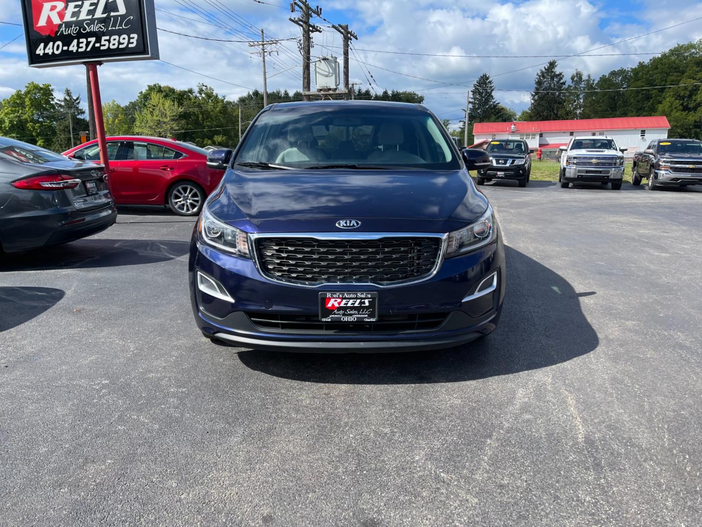 2020 Blue /Tan Kia Sedona LX (KNDMB5C12L6) with an 3.3L V6 DOHC 24V engine, 8-Speed Automatic transmission, located at 547 E. Main St., Orwell, OH, 44076, (440) 437-5893, 41.535435, -80.847855 - Photo#2