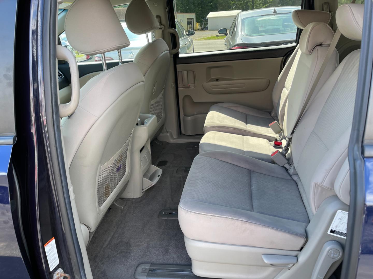 2020 Blue /Tan Kia Sedona LX (KNDMB5C12L6) with an 3.3L V6 DOHC 24V engine, 8-Speed Automatic transmission, located at 547 E. Main St., Orwell, OH, 44076, (440) 437-5893, 41.535435, -80.847855 - Photo#34