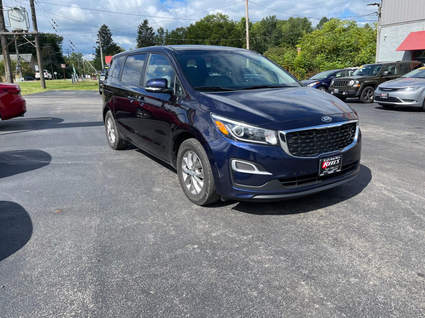 2020 Blue /Tan Kia Sedona LX (KNDMB5C12L6) with an 3.3L V6 DOHC 24V engine, 8-Speed Automatic transmission, located at 547 E. Main St., Orwell, OH, 44076, (440) 437-5893, 41.535435, -80.847855 - Photo#3