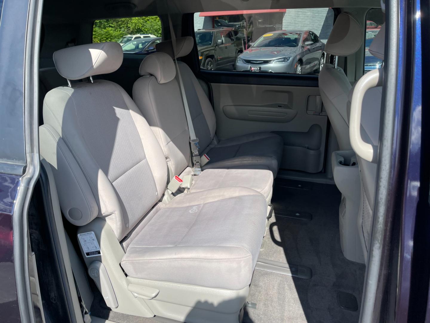 2020 Blue /Tan Kia Sedona LX (KNDMB5C12L6) with an 3.3L V6 DOHC 24V engine, 8-Speed Automatic transmission, located at 547 E. Main St., Orwell, OH, 44076, (440) 437-5893, 41.535435, -80.847855 - Photo#40