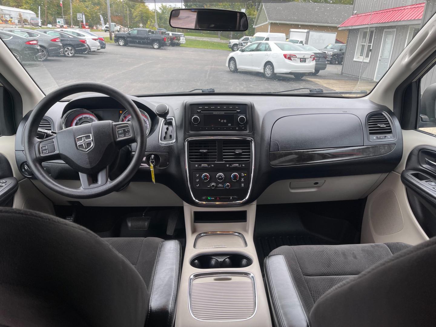 2012 Gold /Black Dodge Grand Caravan SXT (2C4RDGCG7CR) with an 3.6L V6 DOHC 24V engine, 6-Speed Automatic transmission, located at 547 E. Main St., Orwell, OH, 44076, (440) 437-5893, 41.535435, -80.847855 - Photo#33