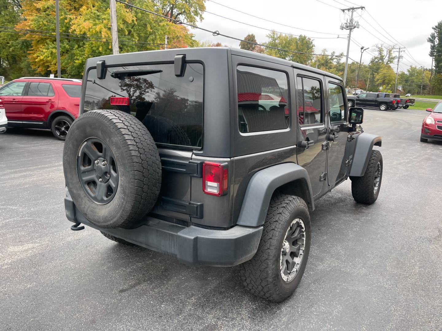 2017 Gray /Black Jeep Wrangler Unlimited Sport 4WD (1C4BJWDG3HL) with an 3.6L V6 DOHC 24V engine, 5 Speed Auto transmission, located at 547 E. Main St., Orwell, OH, 44076, (440) 437-5893, 41.535435, -80.847855 - Photo#9