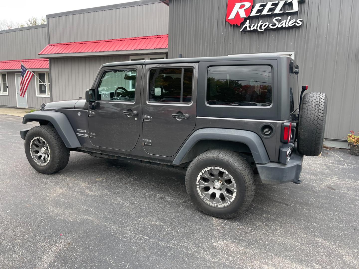 2017 Gray /Black Jeep Wrangler Unlimited Sport 4WD (1C4BJWDG3HL) with an 3.6L V6 DOHC 24V engine, 5 Speed Auto transmission, located at 547 E. Main St., Orwell, OH, 44076, (440) 437-5893, 41.535435, -80.847855 - Photo#11