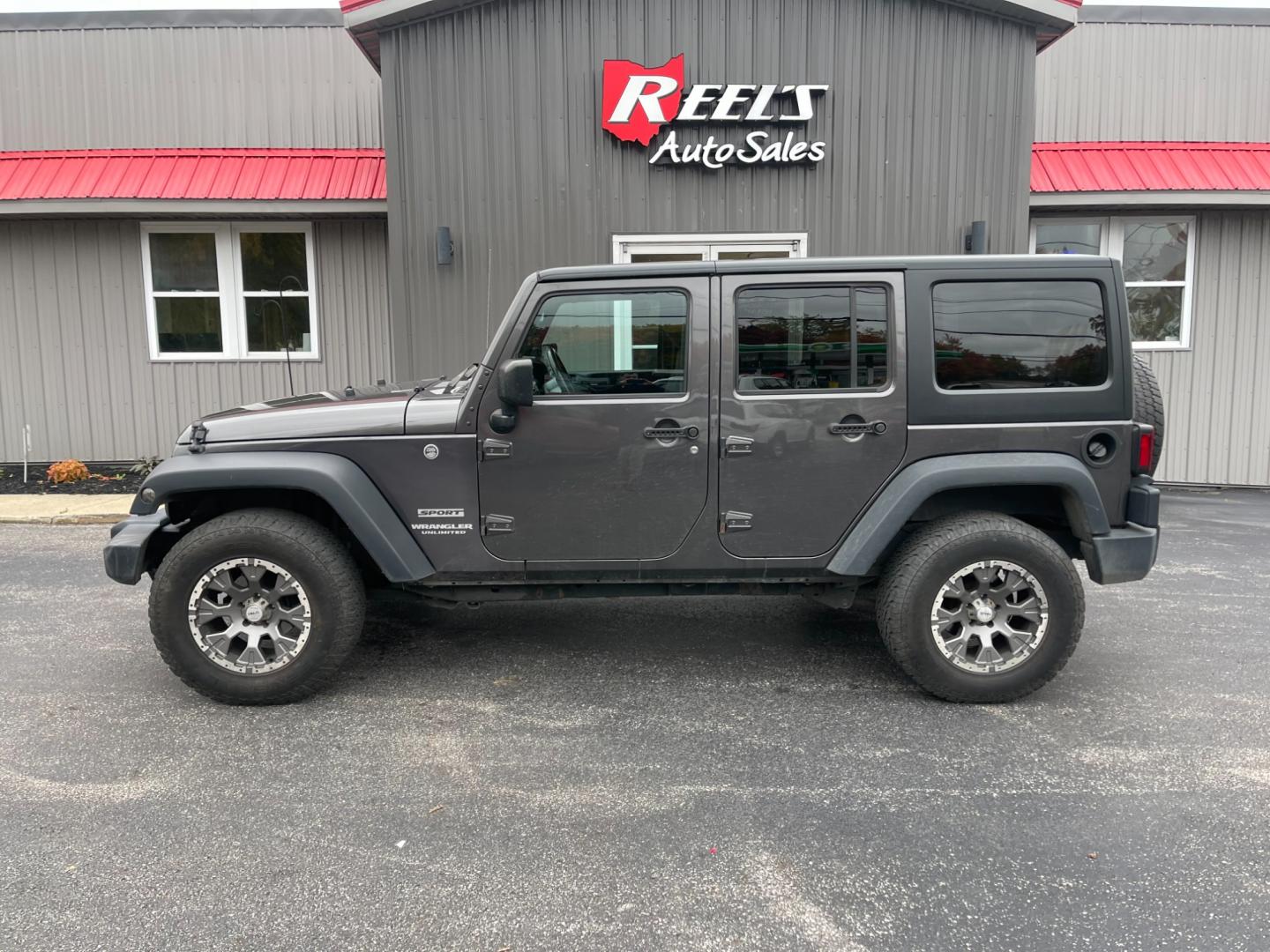 2017 Gray /Black Jeep Wrangler Unlimited Sport 4WD (1C4BJWDG3HL) with an 3.6L V6 DOHC 24V engine, 5 Speed Auto transmission, located at 547 E. Main St., Orwell, OH, 44076, (440) 437-5893, 41.535435, -80.847855 - Photo#13