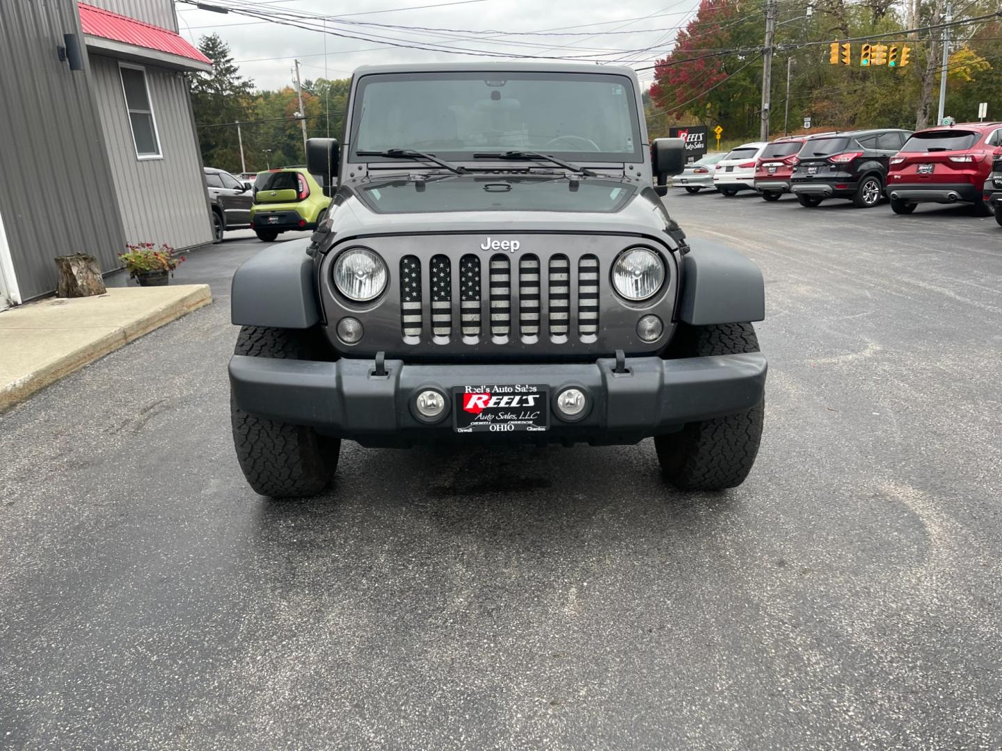 2017 Gray /Black Jeep Wrangler Unlimited Sport 4WD (1C4BJWDG3HL) with an 3.6L V6 DOHC 24V engine, 5 Speed Auto transmission, located at 547 E. Main St., Orwell, OH, 44076, (440) 437-5893, 41.535435, -80.847855 - Photo#1