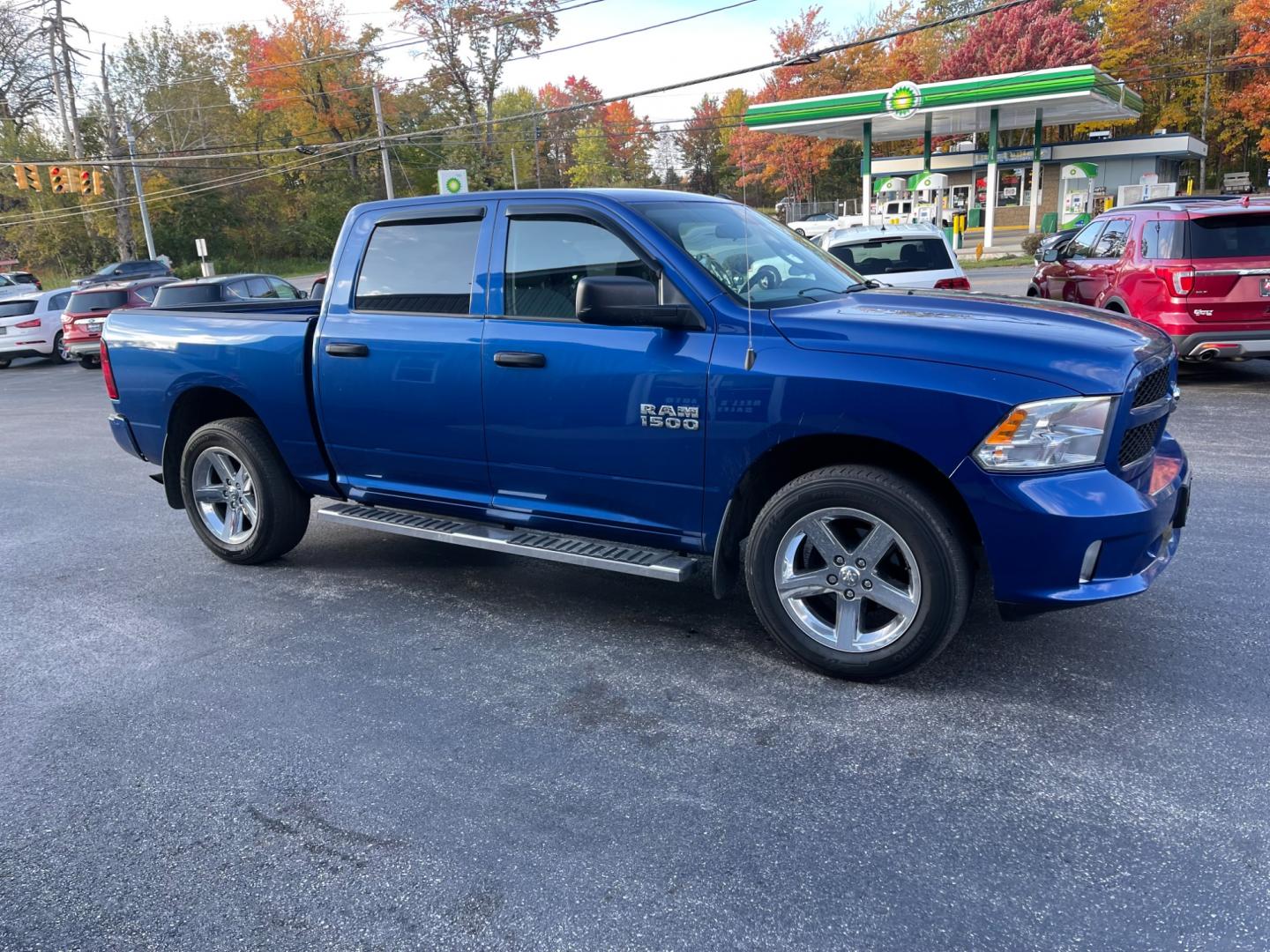 2018 Blue /Black RAM 1500 Express Crew Cab SWB 4WD (3C6RR7KG3JG) with an 3.6L V6 DOHC 24V FFV engine, 8A transmission, located at 547 E. Main St., Orwell, OH, 44076, (440) 437-5893, 41.535435, -80.847855 - Photo#3