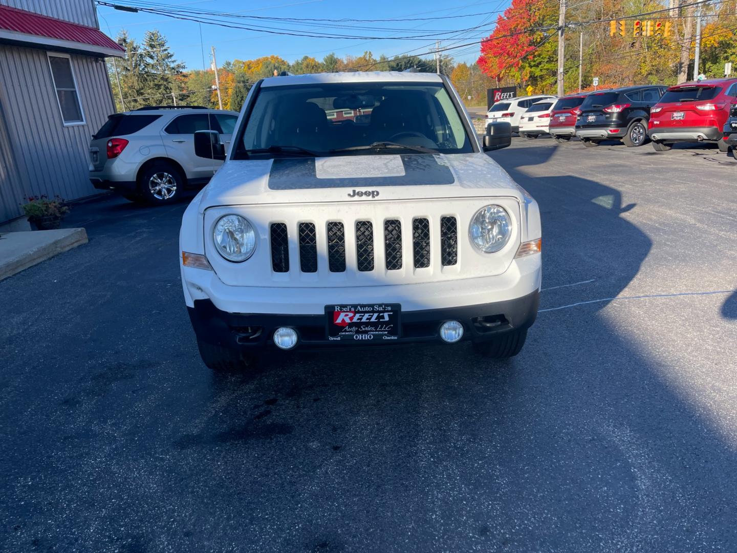 2016 White /Black Jeep Patriot Sport SE 4WD (1C4NJRBB8GD) with an 2.4L I4 DOHC 16V engine, 6-Speed Automatic transmission, located at 11115 Chardon Rd. , Chardon, OH, 44024, (440) 214-9705, 41.580246, -81.241943 - Photo#1