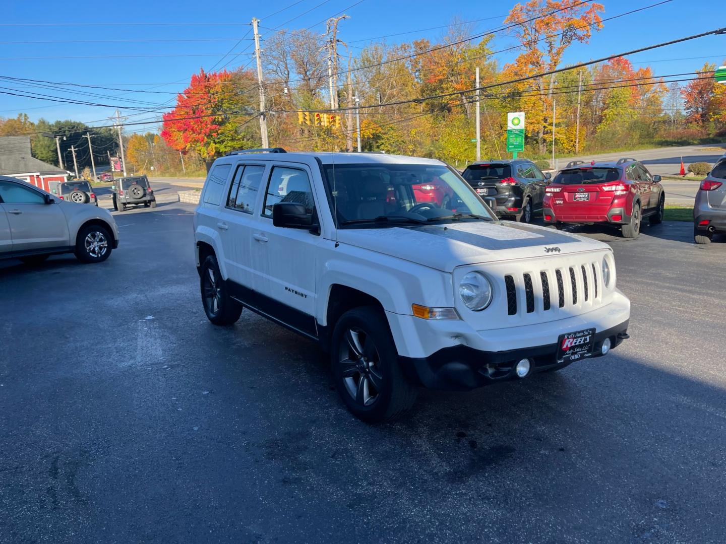 2016 White /Black Jeep Patriot Sport SE 4WD (1C4NJRBB8GD) with an 2.4L I4 DOHC 16V engine, 6-Speed Automatic transmission, located at 11115 Chardon Rd. , Chardon, OH, 44024, (440) 214-9705, 41.580246, -81.241943 - Photo#2