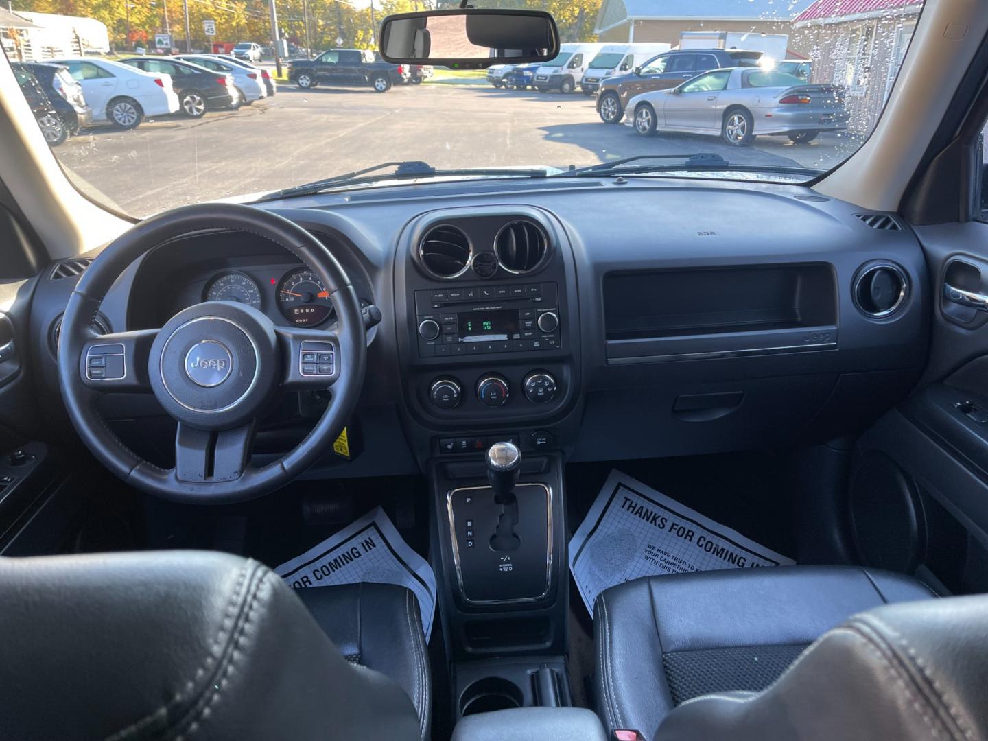 2016 White /Black Jeep Patriot Sport SE 4WD (1C4NJRBB8GD) with an 2.4L I4 DOHC 16V engine, 6-Speed Automatic transmission, located at 11115 Chardon Rd. , Chardon, OH, 44024, (440) 214-9705, 41.580246, -81.241943 - Photo#34