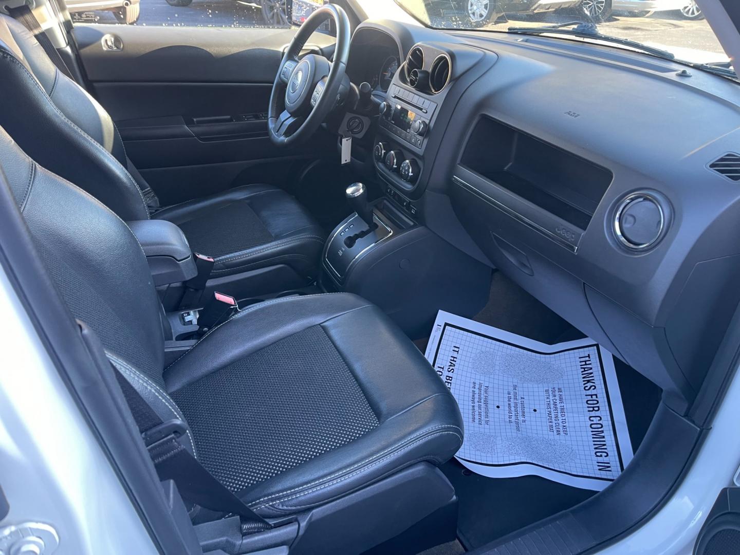 2016 White /Black Jeep Patriot Sport SE 4WD (1C4NJRBB8GD) with an 2.4L I4 DOHC 16V engine, 6-Speed Automatic transmission, located at 11115 Chardon Rd. , Chardon, OH, 44024, (440) 214-9705, 41.580246, -81.241943 - Photo#38