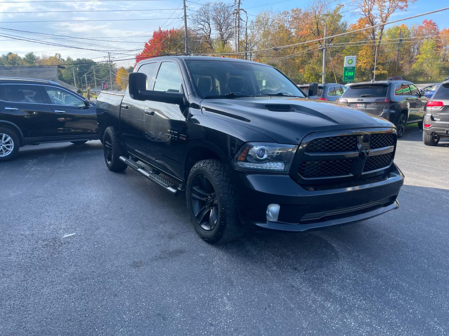 2017 Black /Black RAM 1500 Night Edition Crew Cab SWB 4WD (1C6RR7MT2HS) with an 5.7L V8 OHV 16V engine, 8A transmission, located at 547 E. Main St., Orwell, OH, 44076, (440) 437-5893, 41.535435, -80.847855 - Photo#2