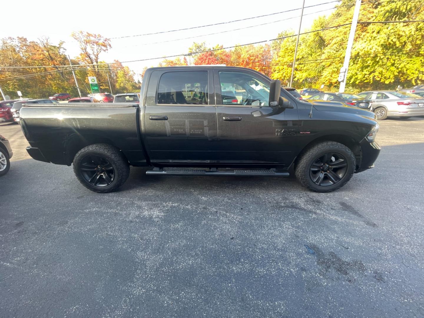 2017 Black /Black RAM 1500 Night Edition Crew Cab SWB 4WD (1C6RR7MT2HS) with an 5.7L V8 OHV 16V engine, 8A transmission, located at 547 E. Main St., Orwell, OH, 44076, (440) 437-5893, 41.535435, -80.847855 - Photo#7