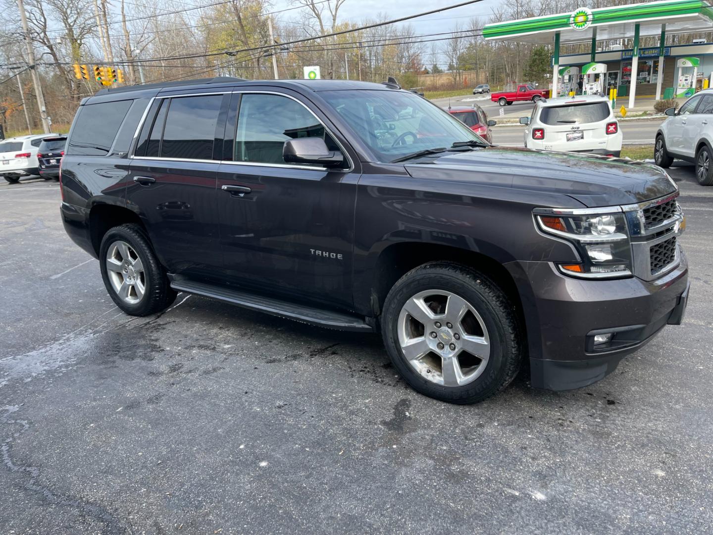 2016 Gray /Black Chevrolet Tahoe LT 4WD (1GNSKBKC0GR) with an 5.3L V8 OHV 16V engine, 6A transmission, located at 547 E. Main St., Orwell, OH, 44076, (440) 437-5893, 41.535435, -80.847855 - Photo#3