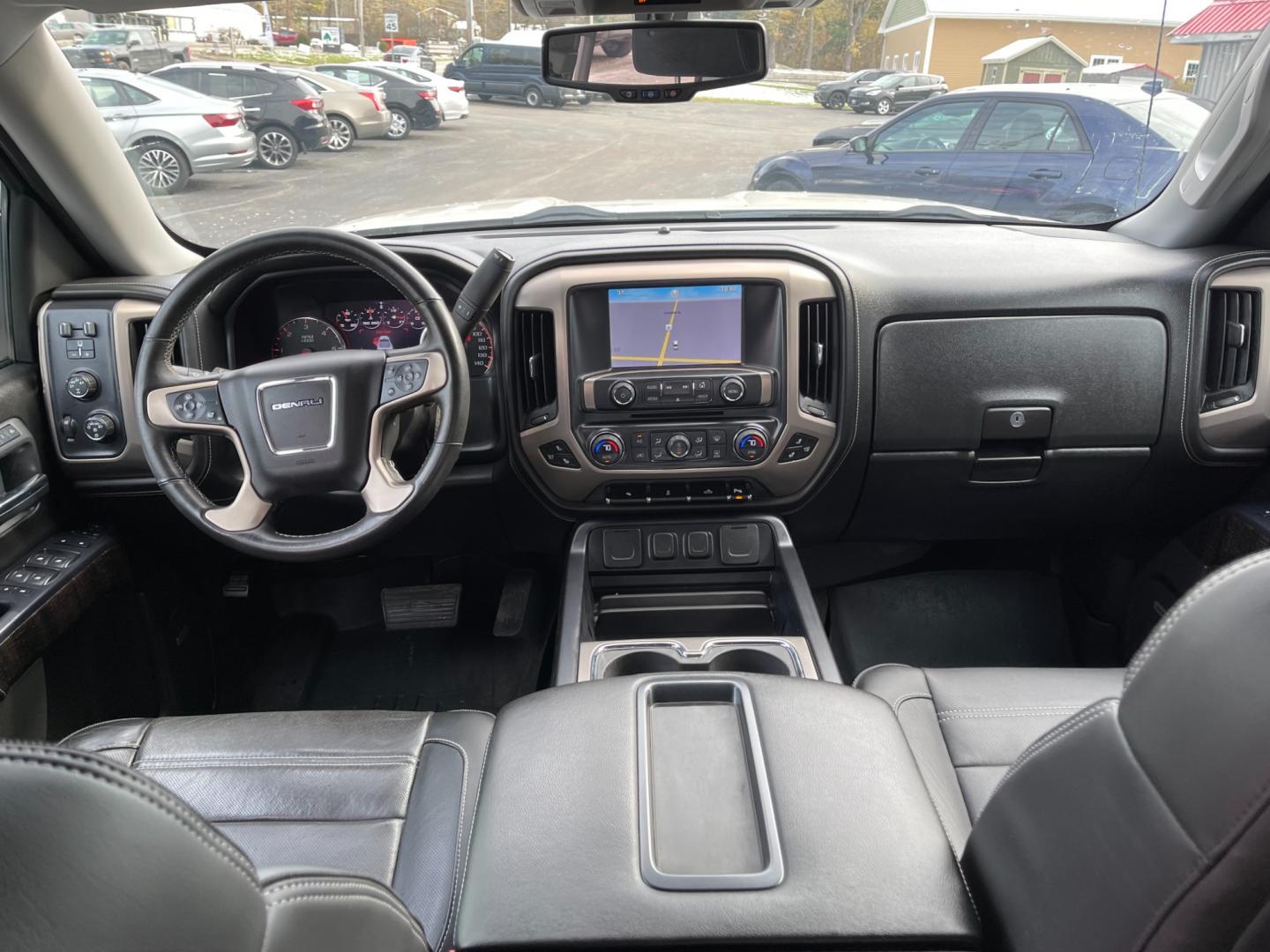 2014 White /Black GMC Sierra 1500 Denali Crew Cab 4WD (3GTU2WEC6EG) with an 5.3L V8 OHV 16V FFV engine, 6-Speed Automatic transmission, located at 11115 Chardon Rd. , Chardon, OH, 44024, (440) 214-9705, 41.580246, -81.241943 - Photo#46