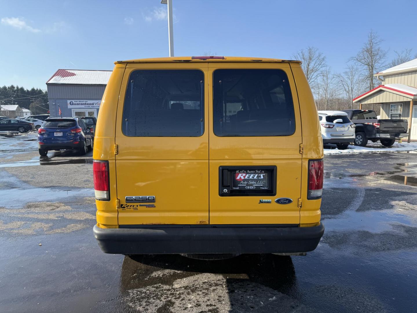 2012 Yellow /Gray Ford E-Series Van E-250 (1FTNE2ELXCD) with an 5.4L V8 SOHC 16V FFV engine, 4-Speed Automatic transmission, located at 11115 Chardon Rd. , Chardon, OH, 44024, (440) 214-9705, 41.580246, -81.241943 - This Fresh Trade 2012 Ford E-250 Passenger Van is a robust vehicle ideal for large group transportation and towing needs. Equipped with a 5.4-liter Triton V8 engine and a 4-speed automatic transmission, it is capable of handling demanding tasks with ease. This van is flex-fuel capable, allowing it t - Photo#18