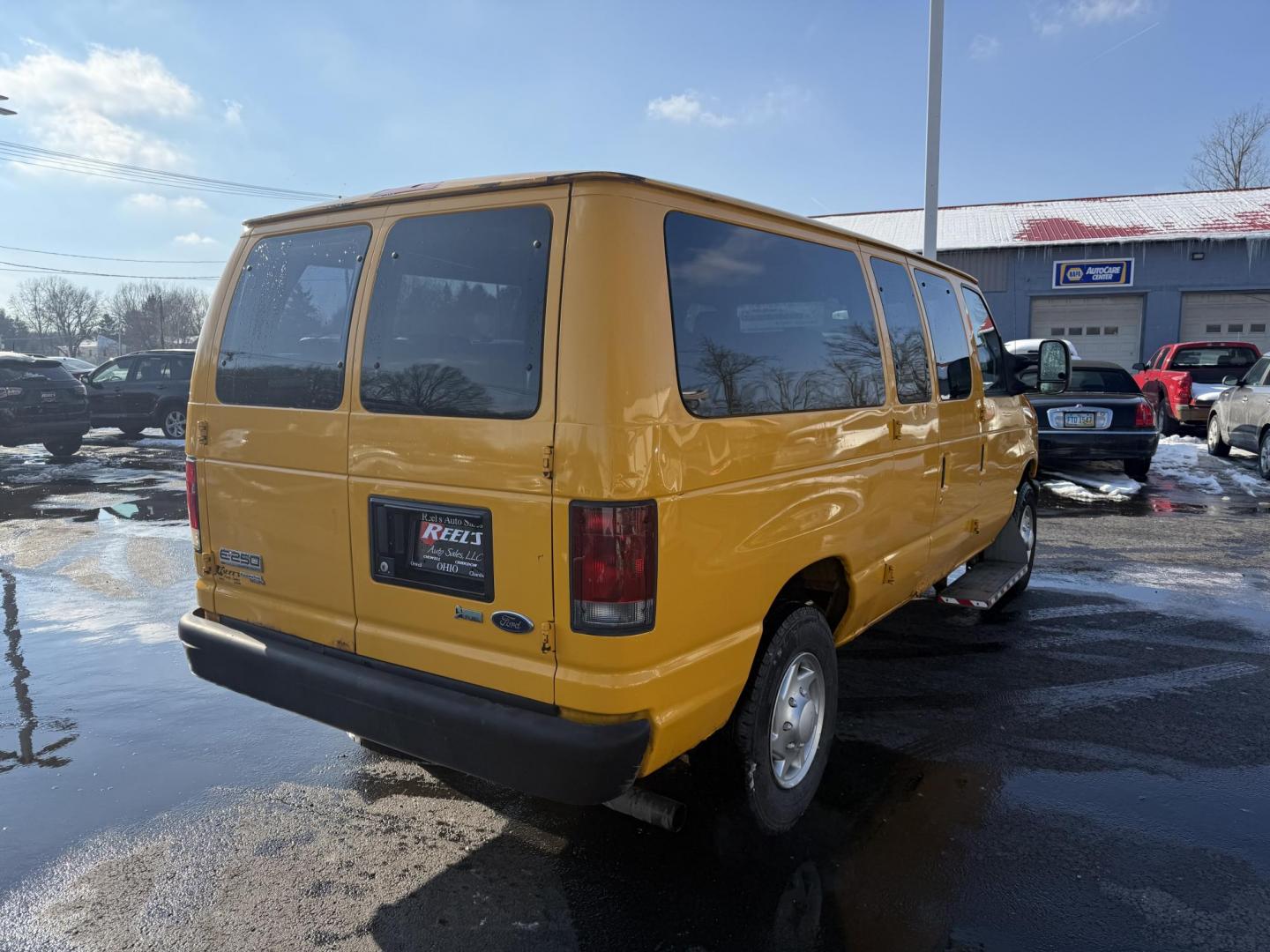 2012 Yellow /Gray Ford E-Series Van E-250 (1FTNE2ELXCD) with an 5.4L V8 SOHC 16V FFV engine, 4-Speed Automatic transmission, located at 11115 Chardon Rd. , Chardon, OH, 44024, (440) 214-9705, 41.580246, -81.241943 - This Fresh Trade 2012 Ford E-250 Passenger Van is a robust vehicle ideal for large group transportation and towing needs. Equipped with a 5.4-liter Triton V8 engine and a 4-speed automatic transmission, it is capable of handling demanding tasks with ease. This van is flex-fuel capable, allowing it t - Photo#17