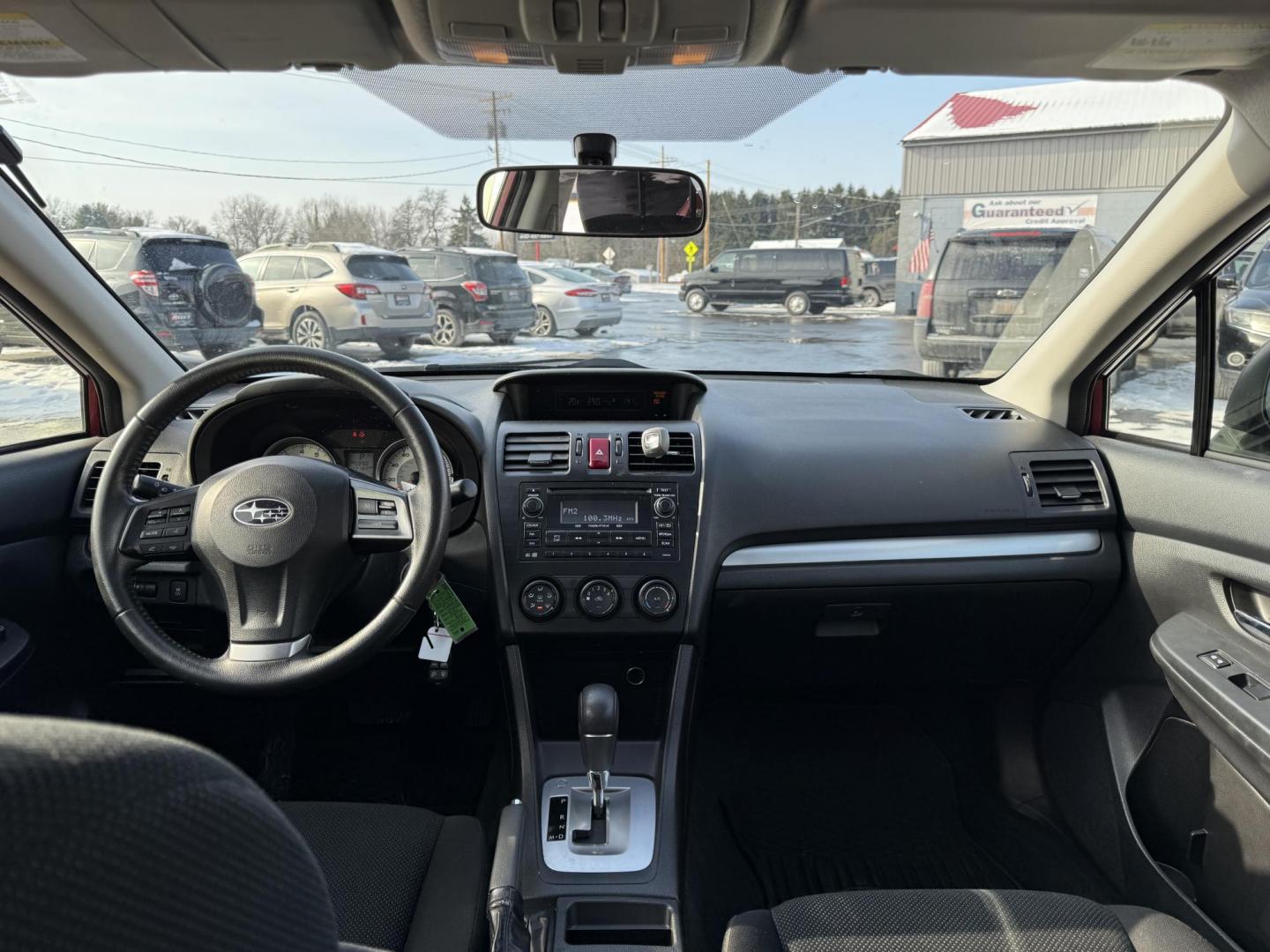 2013 Red /Black Subaru Impreza Premium (JF1GJAD60DH) with an 2.0L H4 DOHC 16V engine, Automatic transmission, located at 547 E. Main St., Orwell, OH, 44076, (440) 437-5893, 41.535435, -80.847855 - This 2013 Subaru Impreza Premium offers a robust combination of performance and efficiency, powered by a 2.0L H4 engine paired with Subaru's renowned Symmetrical All-Wheel Drive (AWD) system, providing excellent traction and stability across various driving conditions. This model achieves an impress - Photo#15