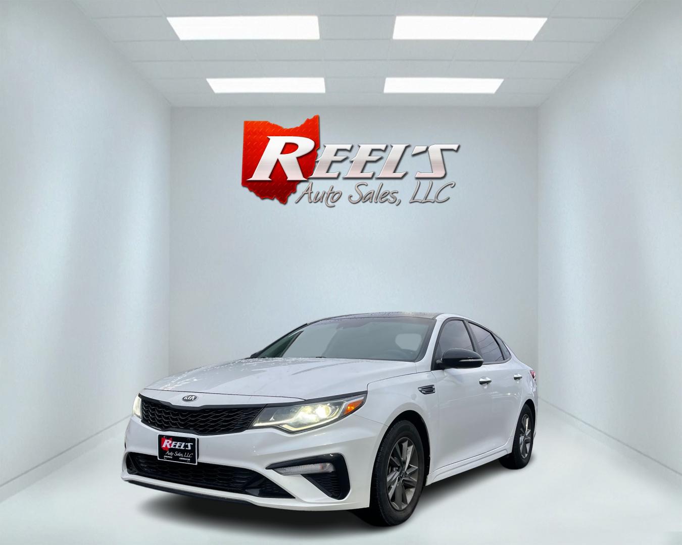 2019 White /Black Kia Optima LX (5XXGT4L36KG) with an 2.4L I4 DOHC 16V engine, 6A transmission, located at 11115 Chardon Rd. , Chardon, OH, 44024, (440) 214-9705, 41.580246, -81.241943 - Photo#0