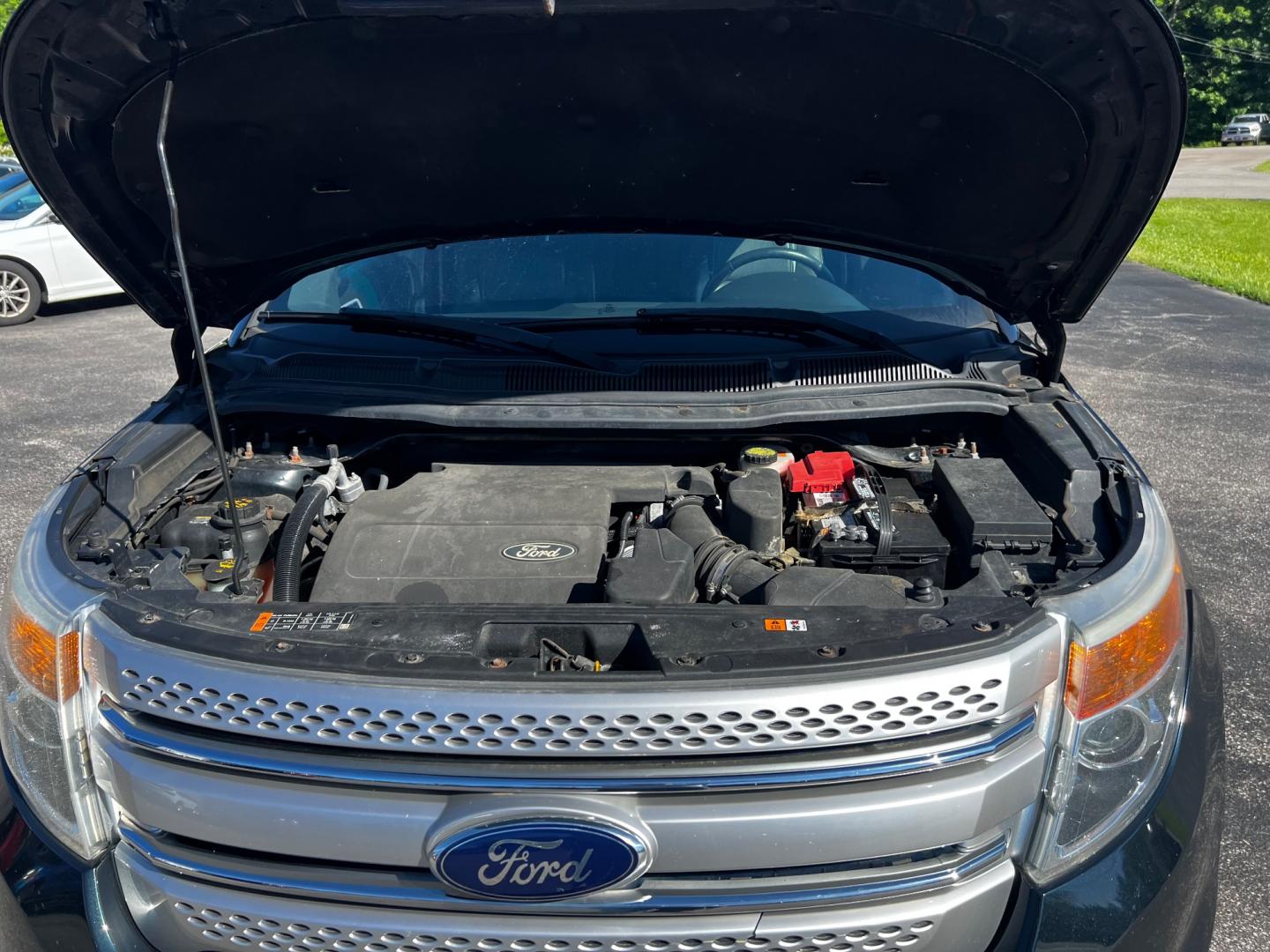 2014 Black /Black Ford Explorer XLT 4WD (1FM5K8D88EG) with an 3.5L V6 DOHC 24V engine, 6-Speed Automatic transmission, located at 547 E. Main St., Orwell, OH, 44076, (440) 437-5893, 41.535435, -80.847855 - This 2014 Ford Explorer XLT 4WD impresses with its comprehensive package, designed to enhance both comfort and utility. A single-owner vehicle, it is equipped with a robust 3.5 DOHC V6 engine paired with a 6-speed automatic transmission, ensuring powerful performance. The interior boasts luxurious l - Photo#13