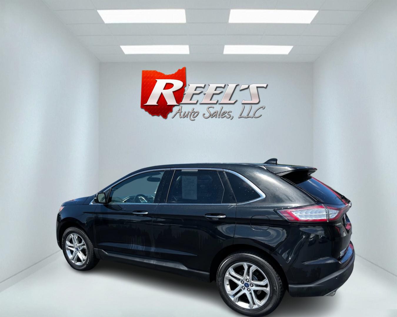 2015 Black /Black Ford Edge Titanium AWD (2FMTK4K96FB) with an 2.0L I4 DOHC 16V Turbo engine, 6-Speed Automatic transmission, located at 547 E. Main St., Orwell, OH, 44076, (440) 437-5893, 41.535435, -80.847855 - Photo#8