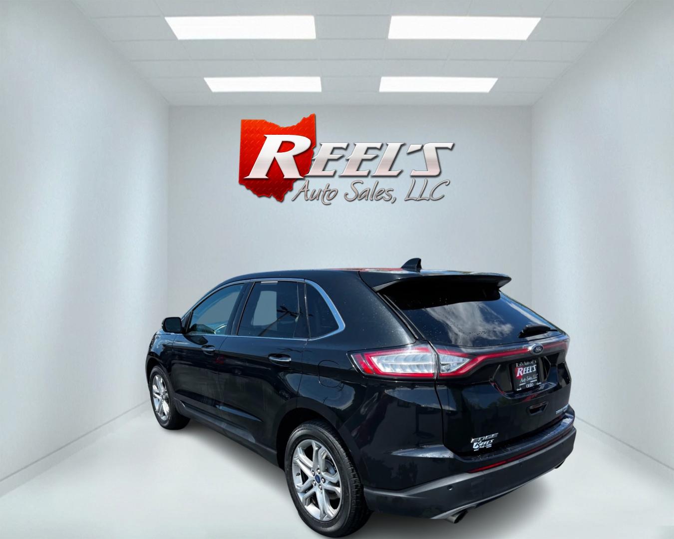 2015 Black /Black Ford Edge Titanium AWD (2FMTK4K96FB) with an 2.0L I4 DOHC 16V Turbo engine, 6-Speed Automatic transmission, located at 547 E. Main St., Orwell, OH, 44076, (440) 437-5893, 41.535435, -80.847855 - Photo#7