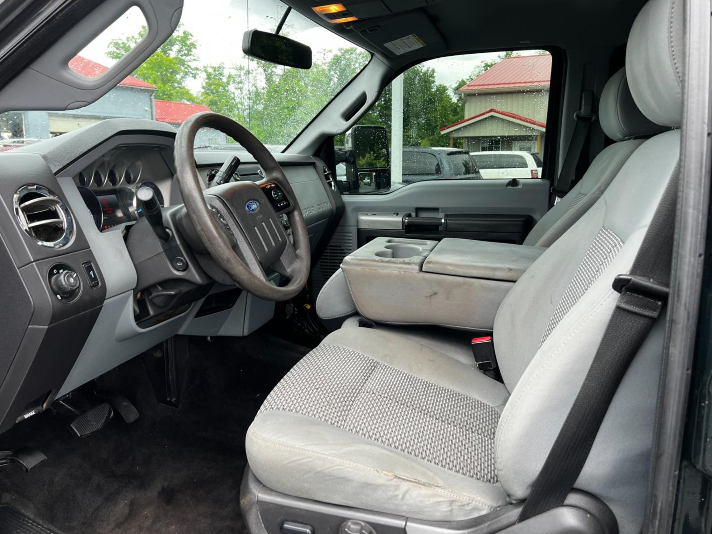 2016 Green /Gray Ford F-250 SD XLT Crew Cab 4WD (1FT7W2B6XGE) with an 6.2L V8 OHV 16V engine, 6-Speed Automatic transmission, located at 547 E. Main St., Orwell, OH, 44076, (440) 437-5893, 41.535435, -80.847855 - Photo#16