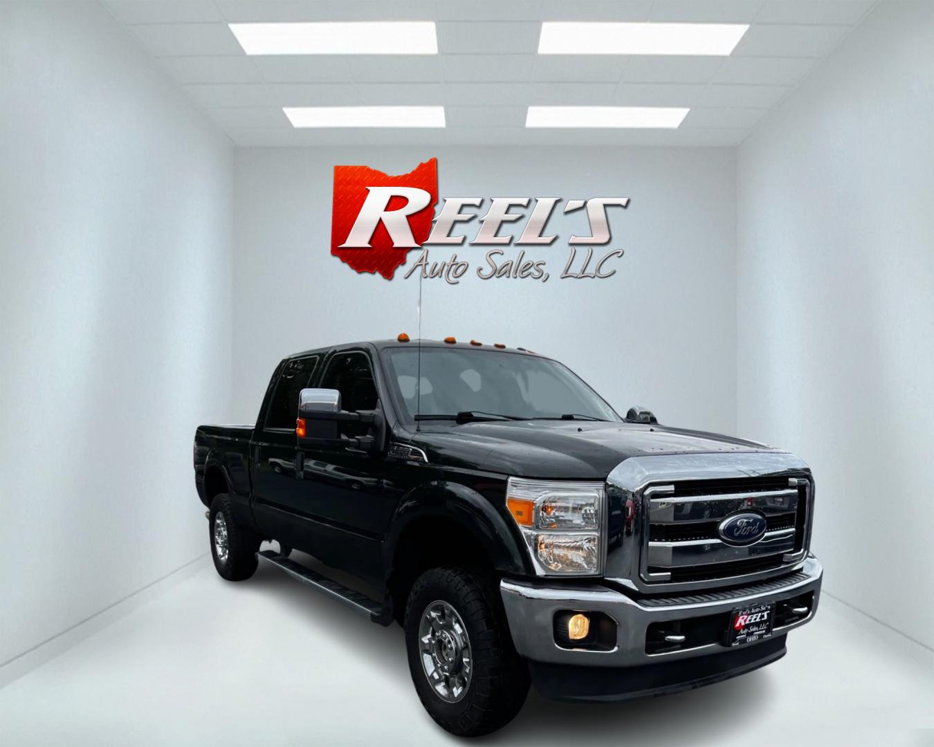 2016 Green /Gray Ford F-250 SD XLT Crew Cab 4WD (1FT7W2B6XGE) with an 6.2L V8 OHV 16V engine, 6-Speed Automatic transmission, located at 547 E. Main St., Orwell, OH, 44076, (440) 437-5893, 41.535435, -80.847855 - Photo#2